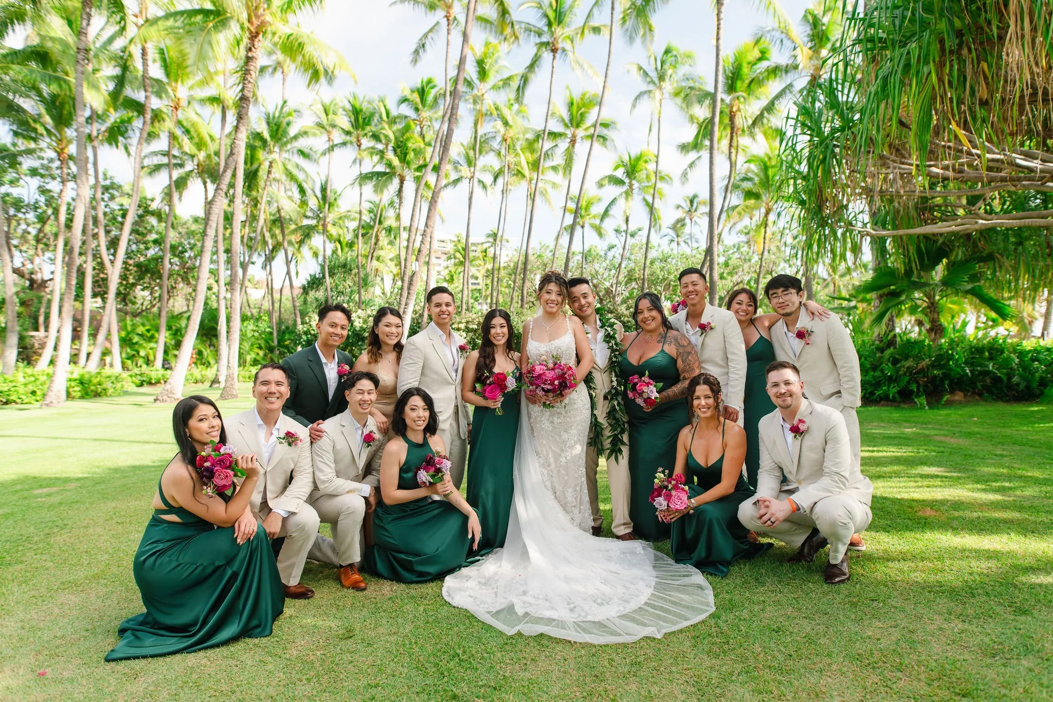 bride and groom with wedding party at wedding in hawaii