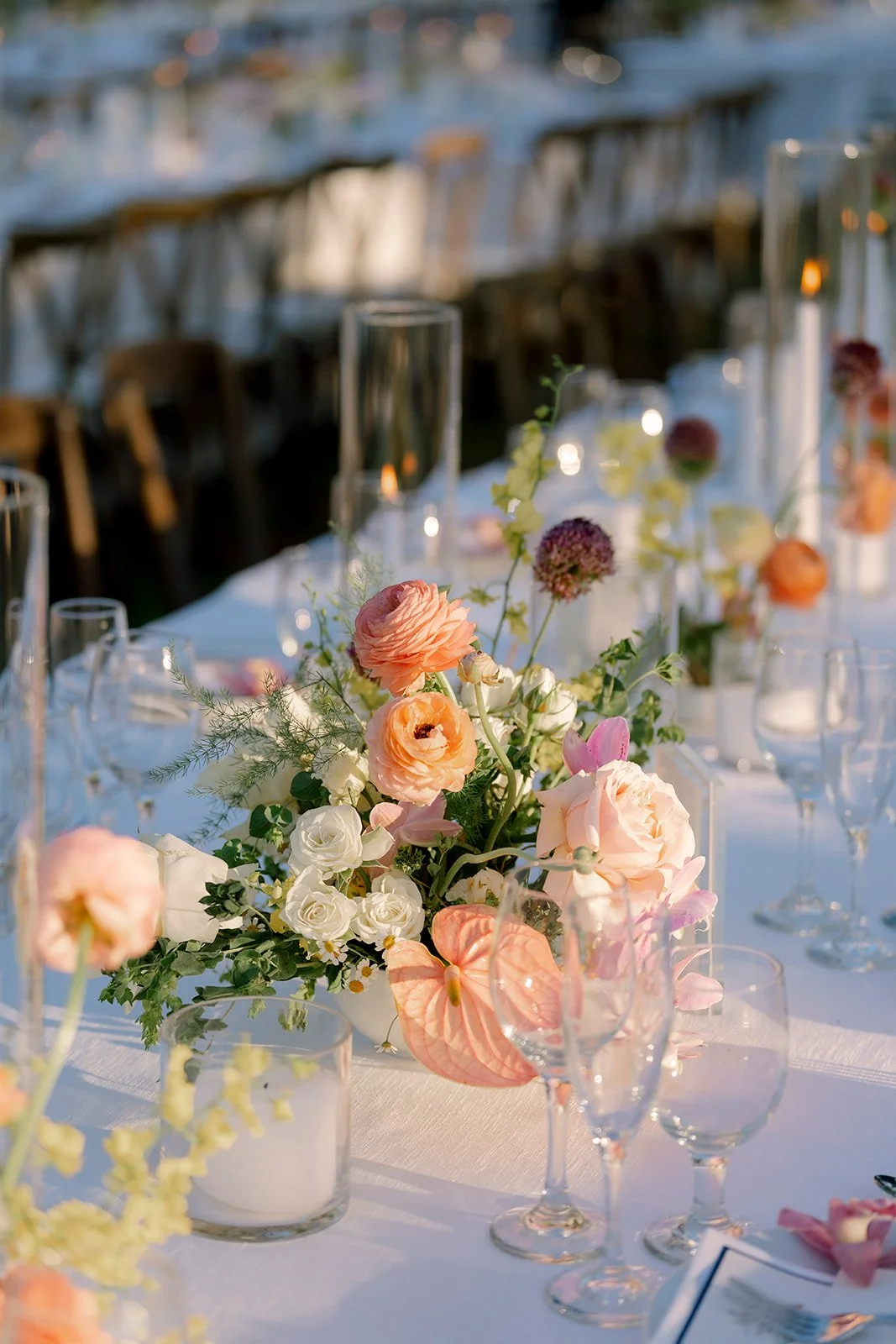 wedding table scape with pastel florals and white linens