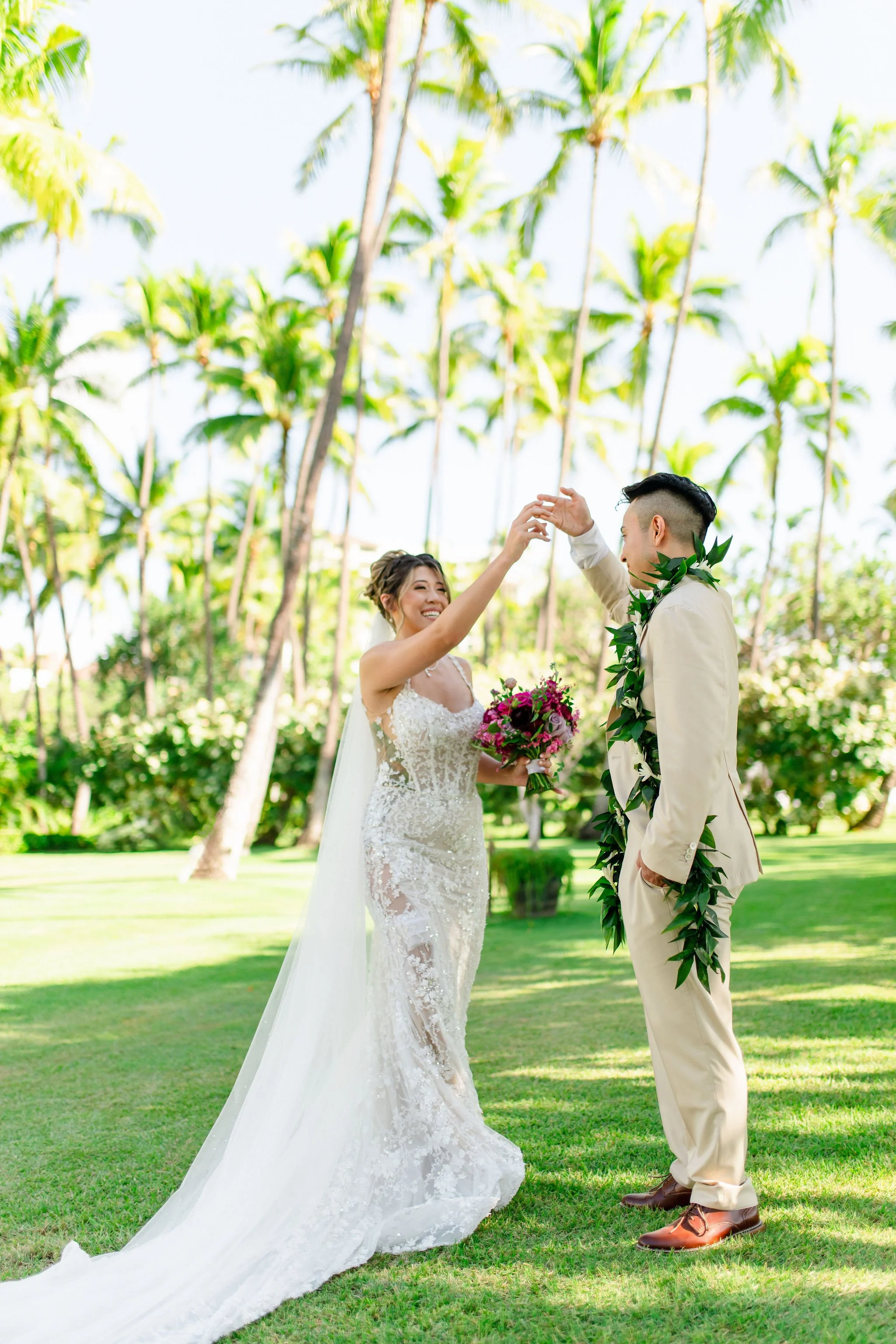 groom and bride during first look at wedding in hawaii