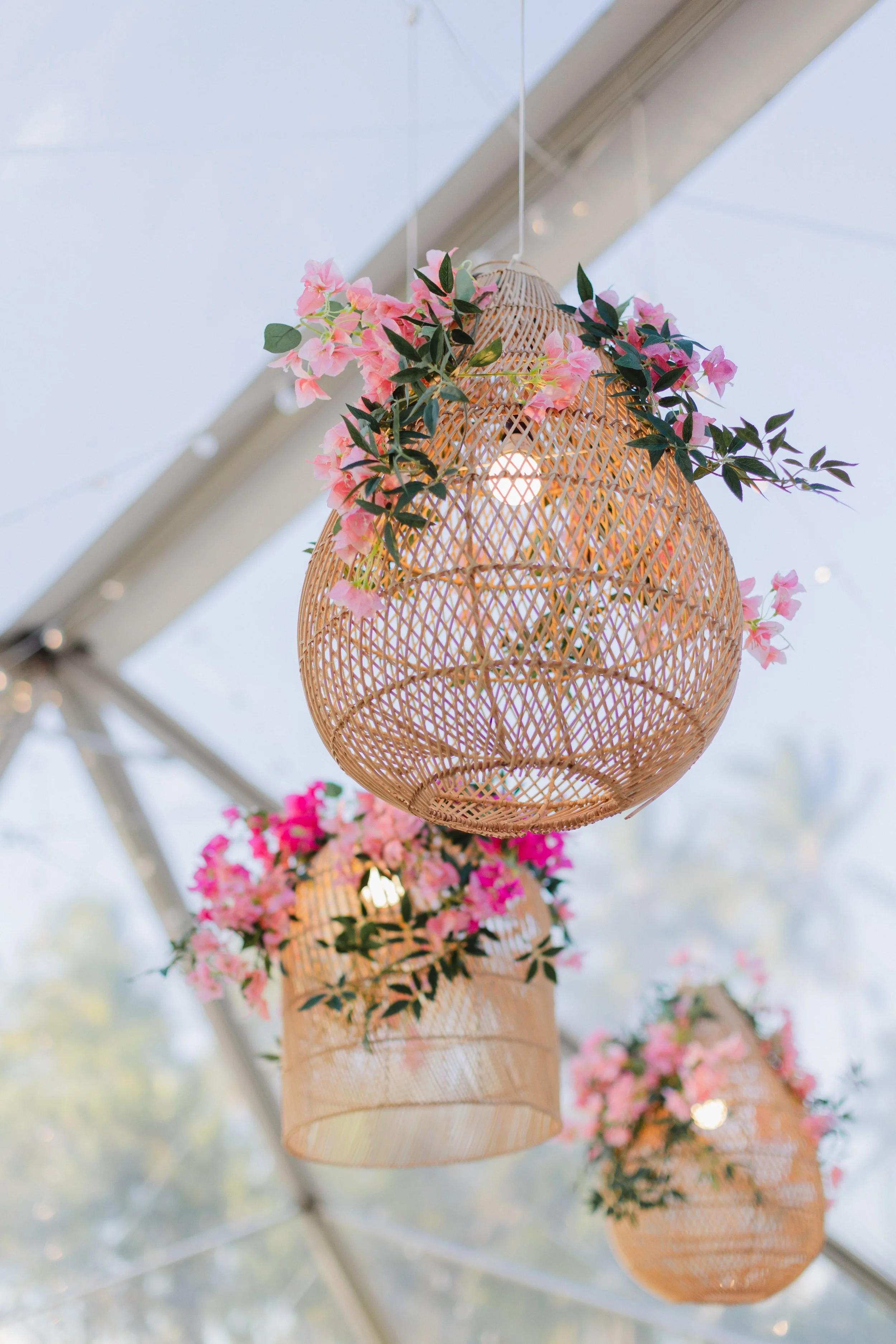 rattan lanterns with pink foliage
