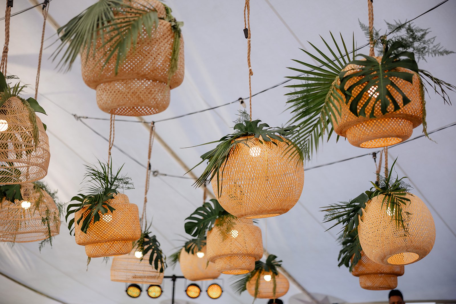 rattan lanterns with greenery