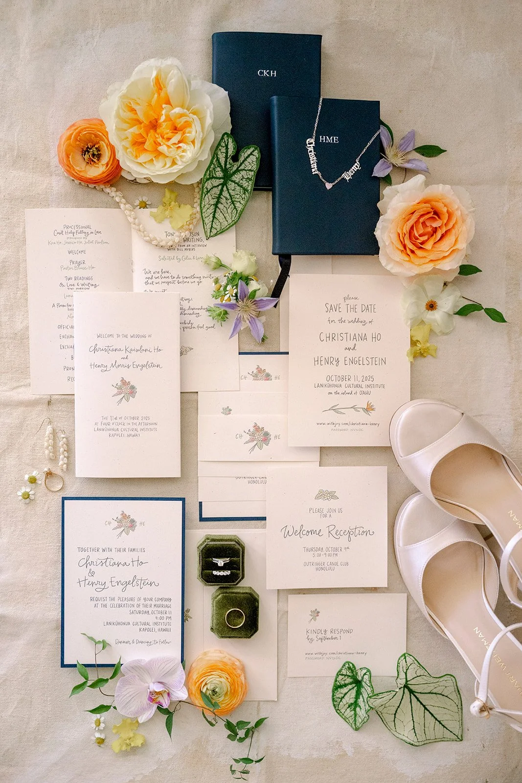 wedding invitations with orange flowers and navy accents