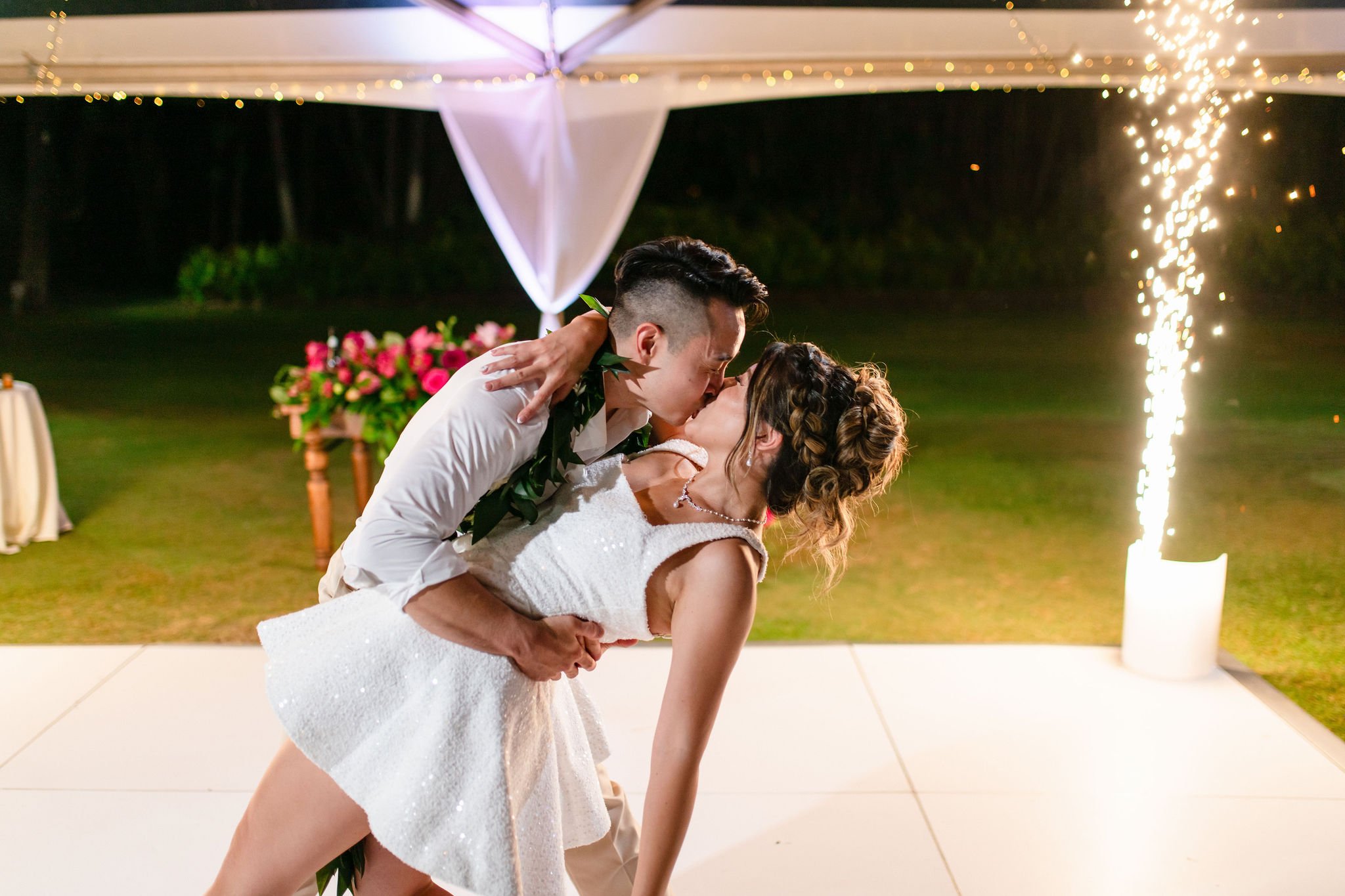 bride and groom kissing during first dance
