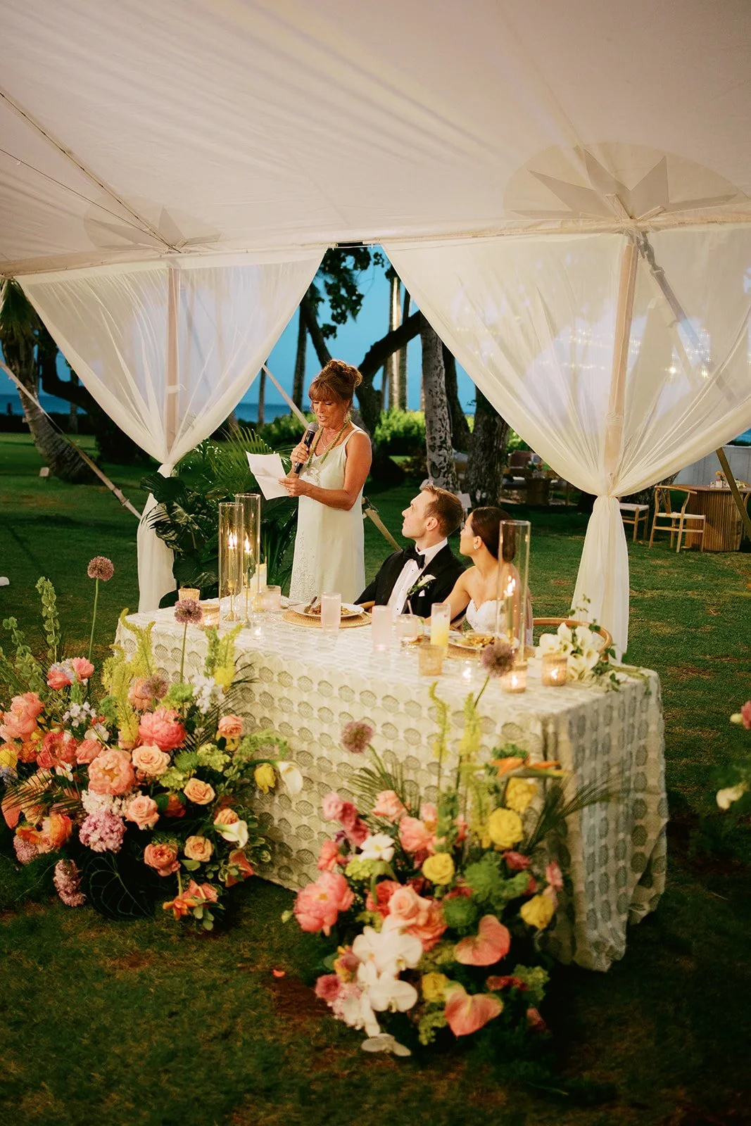 mother of the groom giving a speech at wedding in hawaii