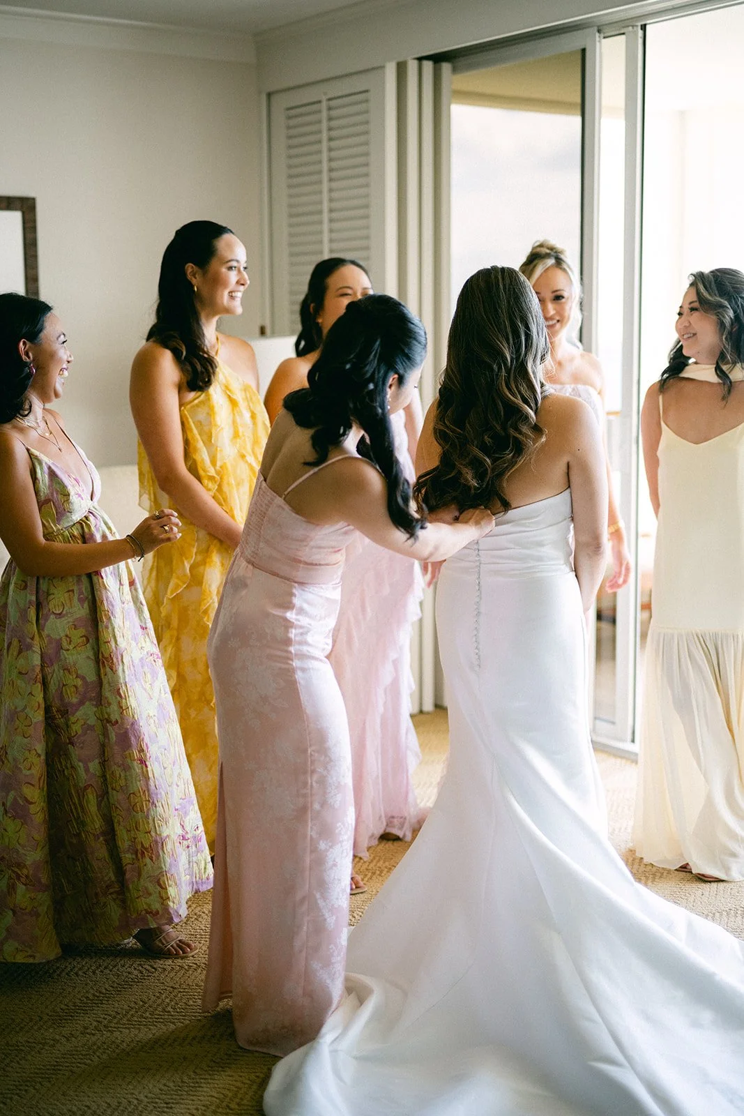 bride getting ready with bridesmaids