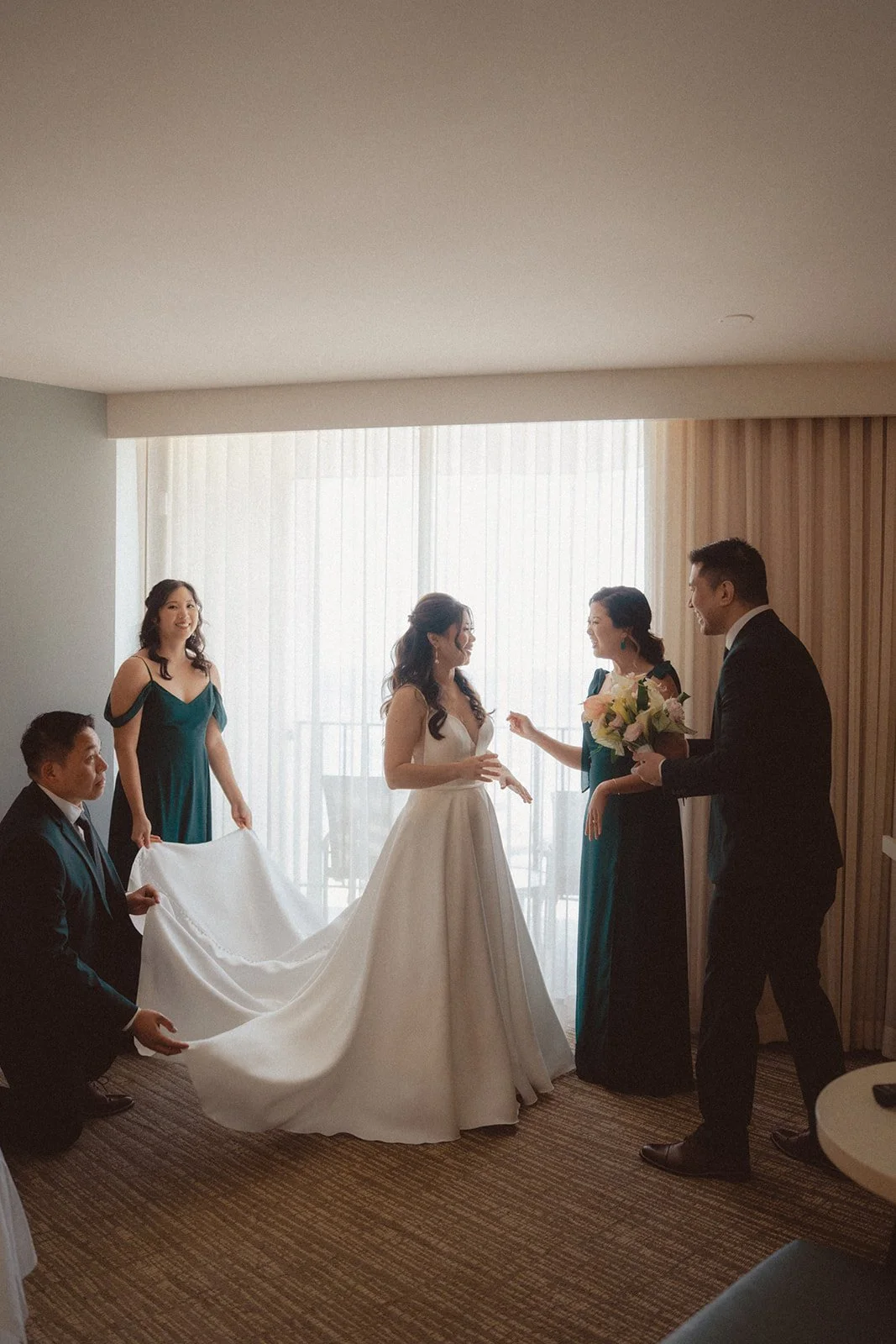 bride getting ready with bridal party