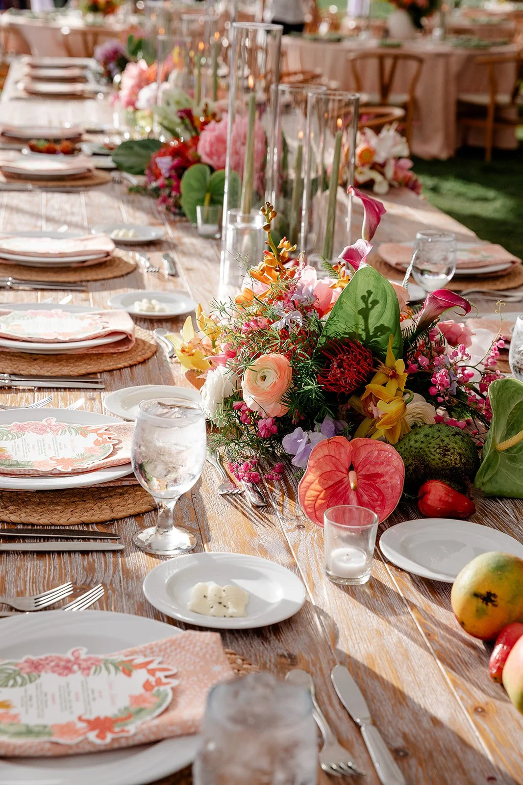 guest table at wedding with tropical decor