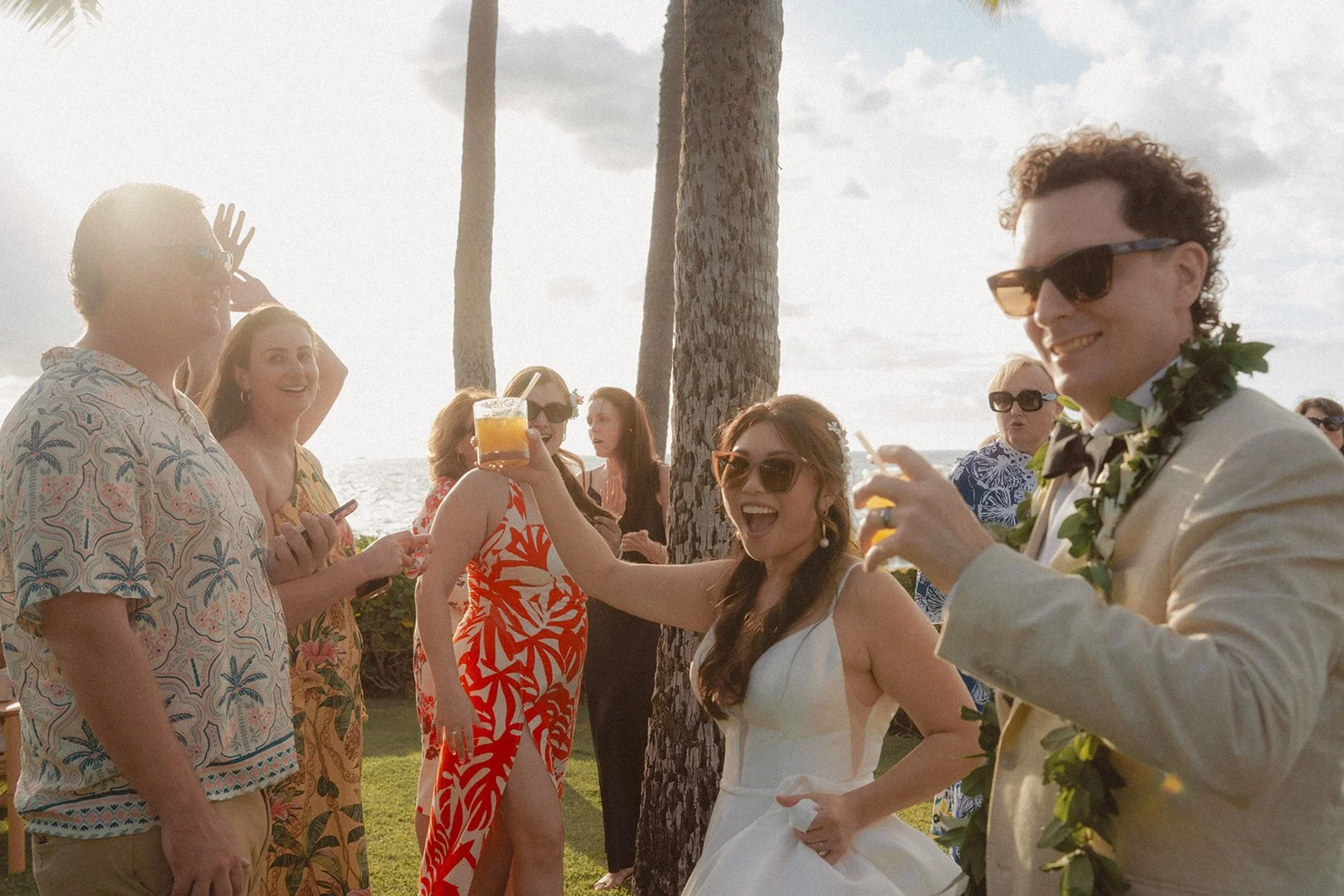 bride and groom drinks at wedding in hawaii