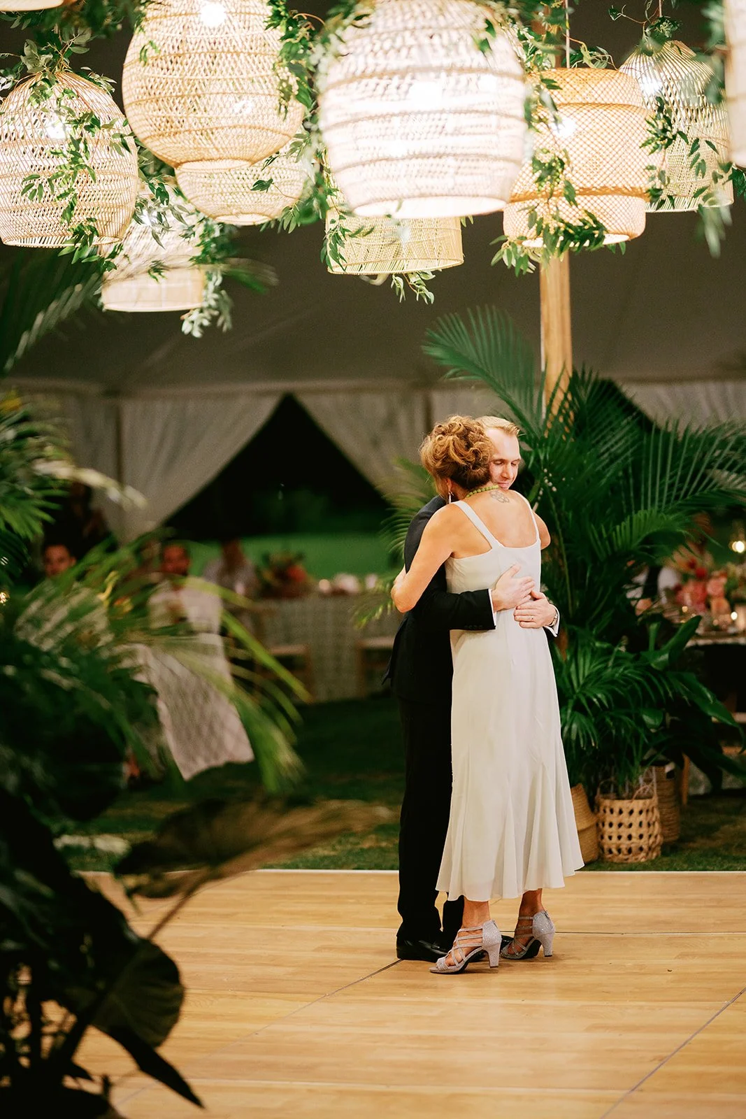 mother son dance under lanterns