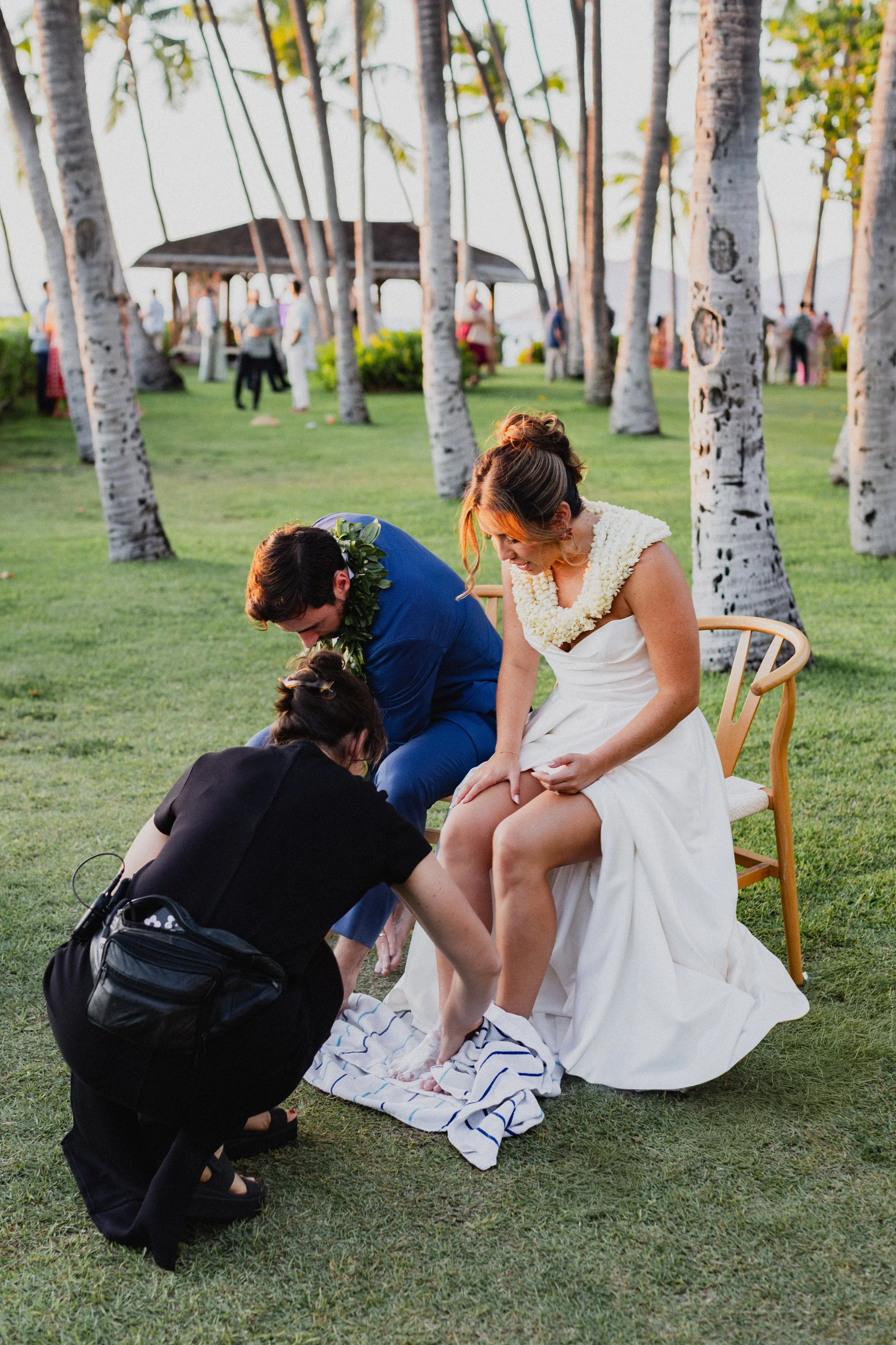 wedding planner helping bride and groom
