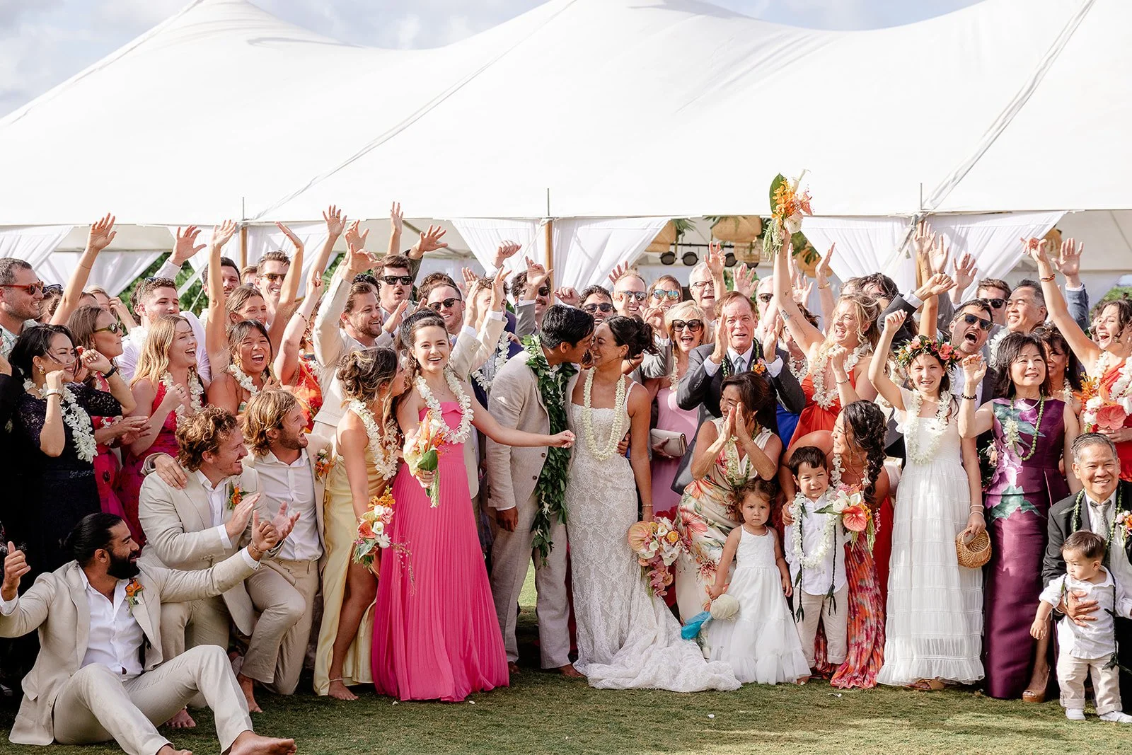 bride and groom with wedding guests