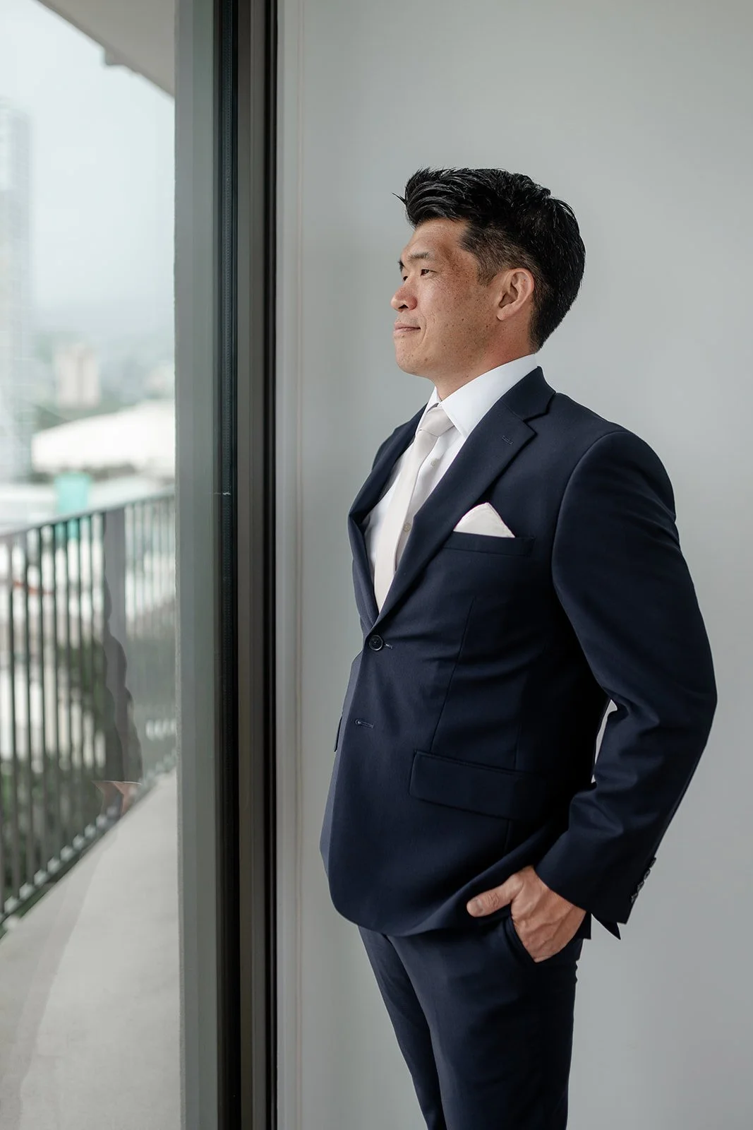 groom in navy suite
