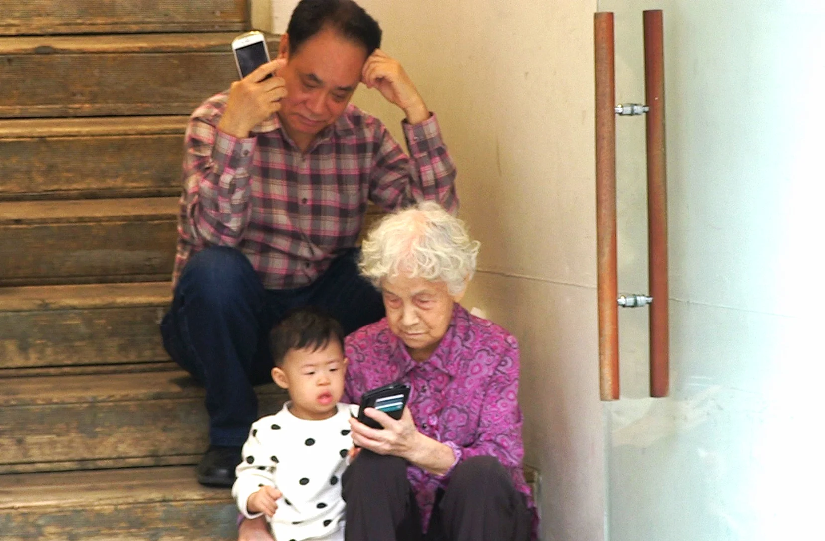 Grandparents with grandson at Namdaemun market