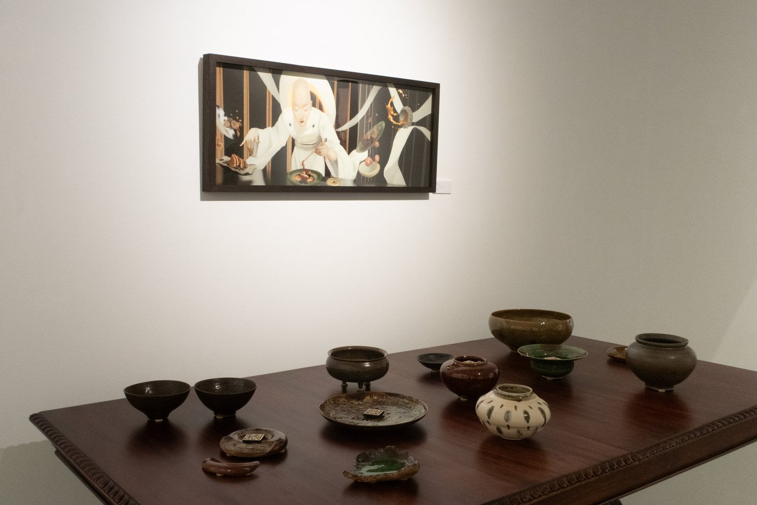  The Banquet: Ceramic ware sit on an antique table, inviting us forward for a ‘feast’ in an alternate universe 