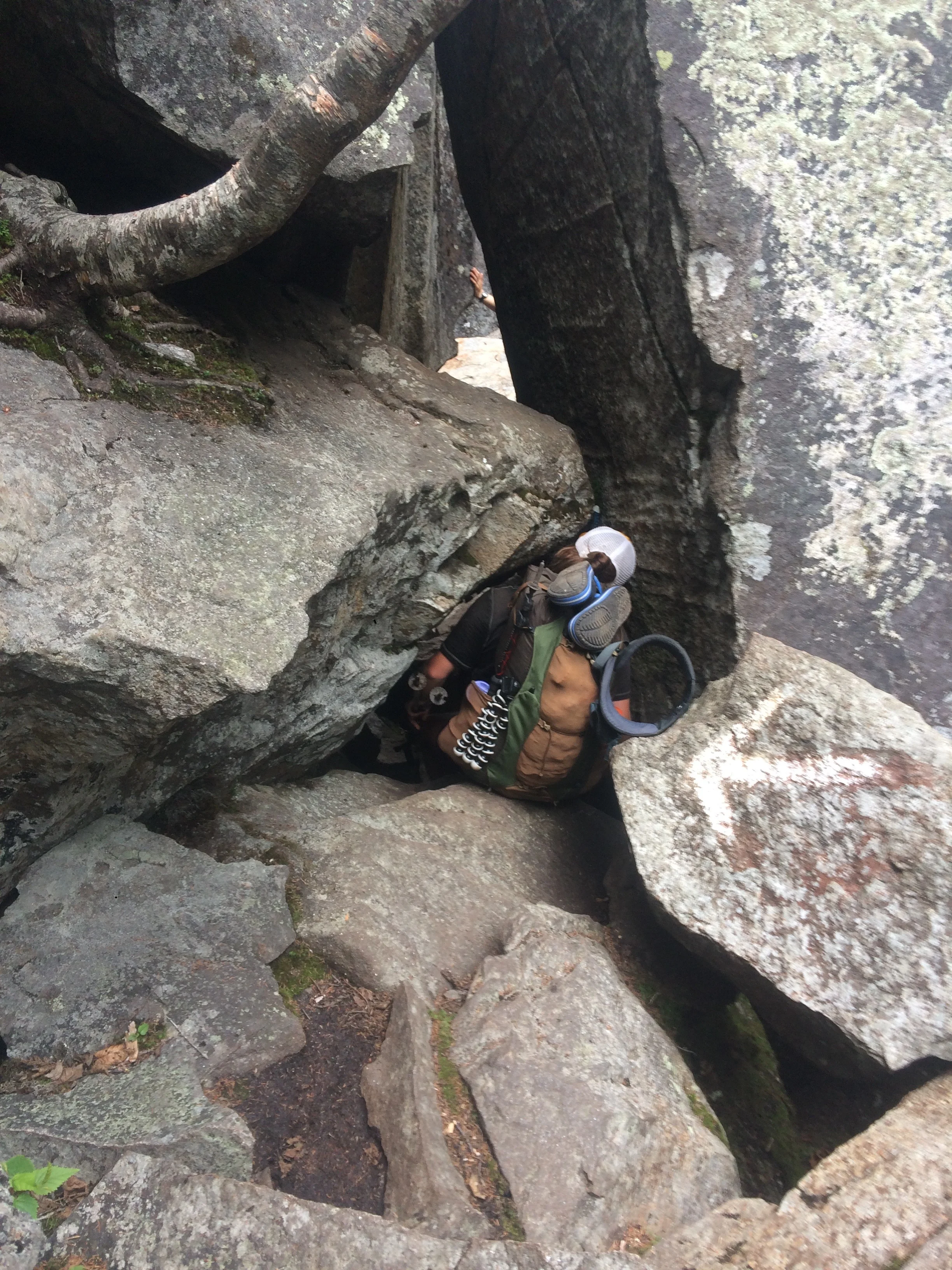 Mahoosuc Notch. The hardest mile on the trail. Here's Neemor scooting through a tight squeeze. Follow the arrows, I guess!