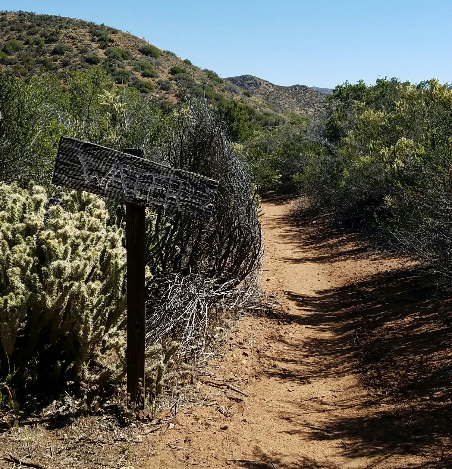 sign to water cache at mile 91