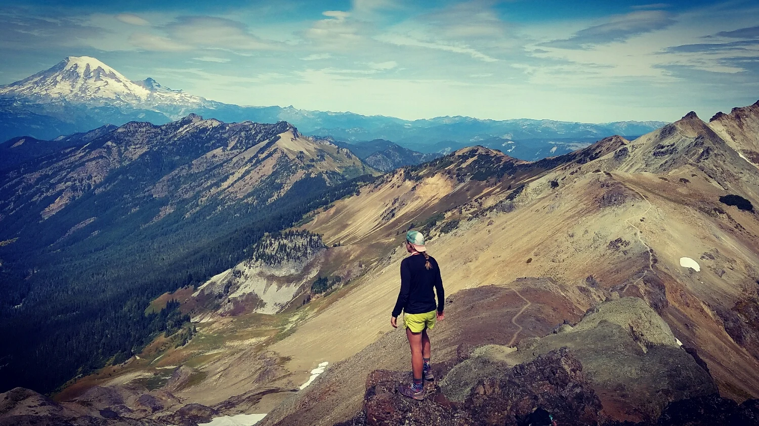 looking out over Mt. Rainier. The PCT, Knife's Edge section is on the right. Ridge walking at its finest!