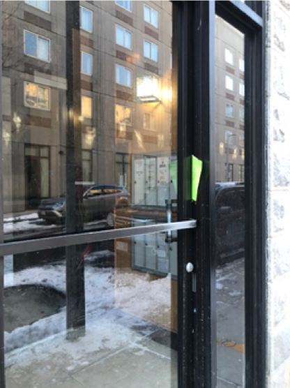 Above: A code enforcement violation ticket is left at an apartment building.
