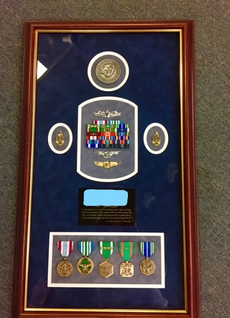 Reddi-Arts frame department can create beautiful shadow boxes for you or your loved one's treasured mementos .