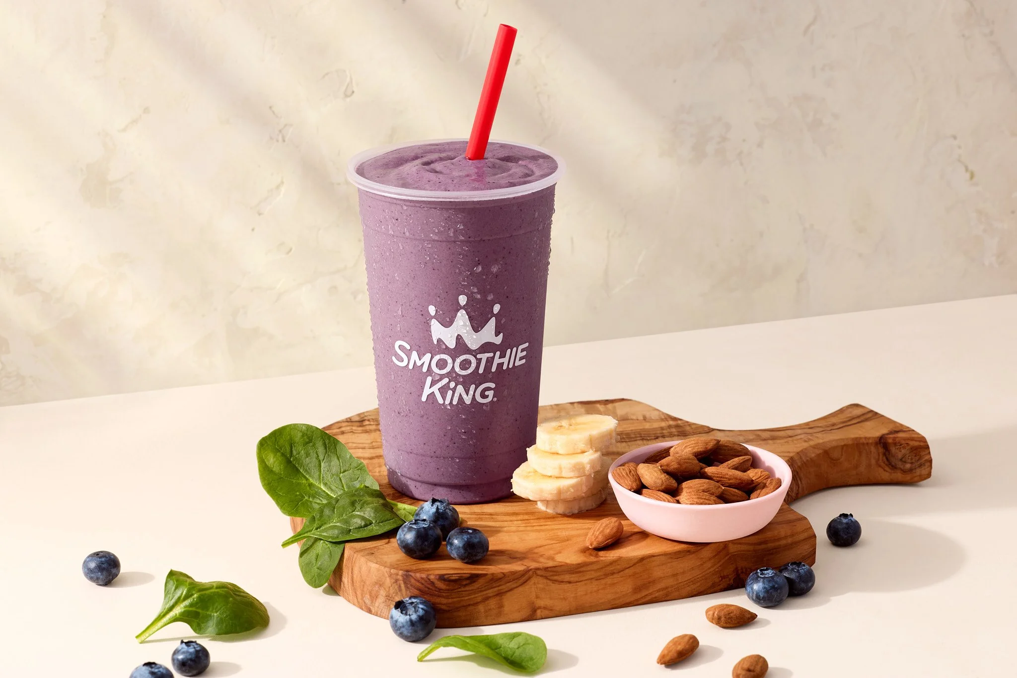 Daily Warrior Smoothie - Purple colored smoothie with blueberries, spinach, banana and almonds from Smoothie King / Jennifer Chong  - Food, Beverage and Lifestyle Photographer