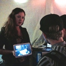  Explaining my experiment to aquarium guests. Credit: Birch Aquarium at Scripps. 