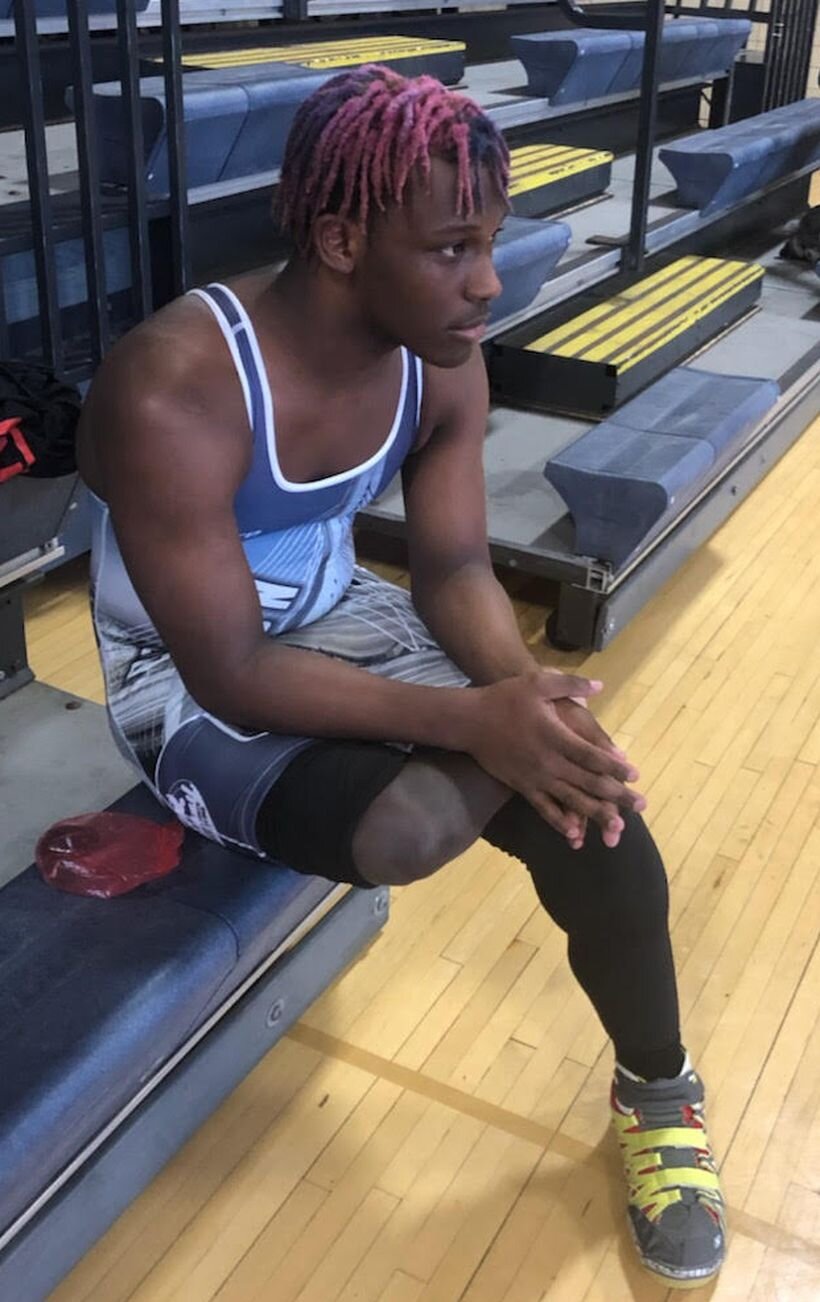 MATCH Charter School grad Malaky Lewis completed a 150-hour coaches in training program through Boston Youth Wrestling.COURTESY PHOTO