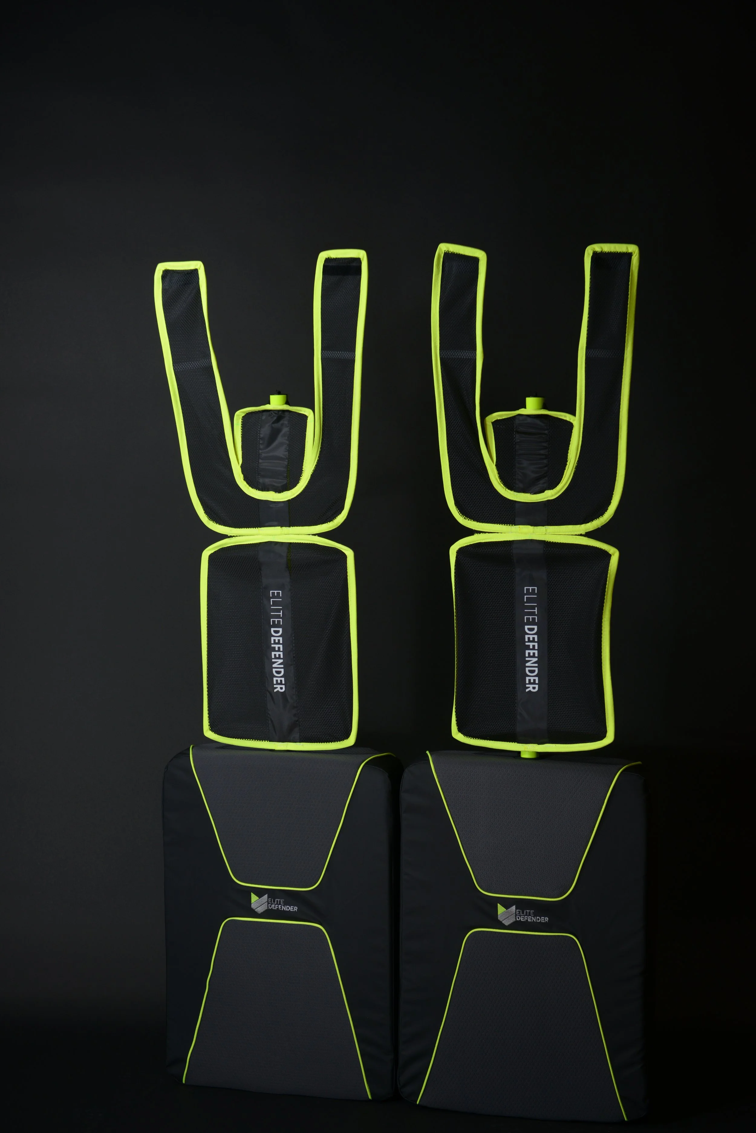 Two Elite Defenders on display in a gym.