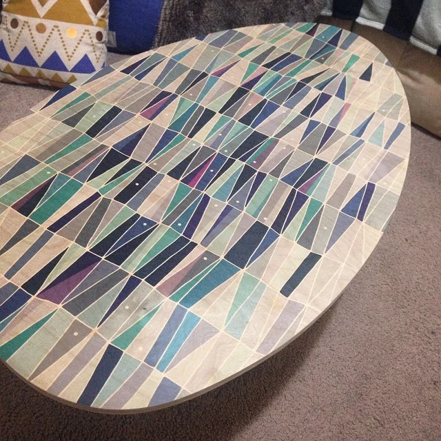 Rolling out the Blue Triangles coffee table! The timber grain showing through the artwork is just so gorgeous. The different shades of blue turned out so well, we are all stocked with the result. Good start! 
