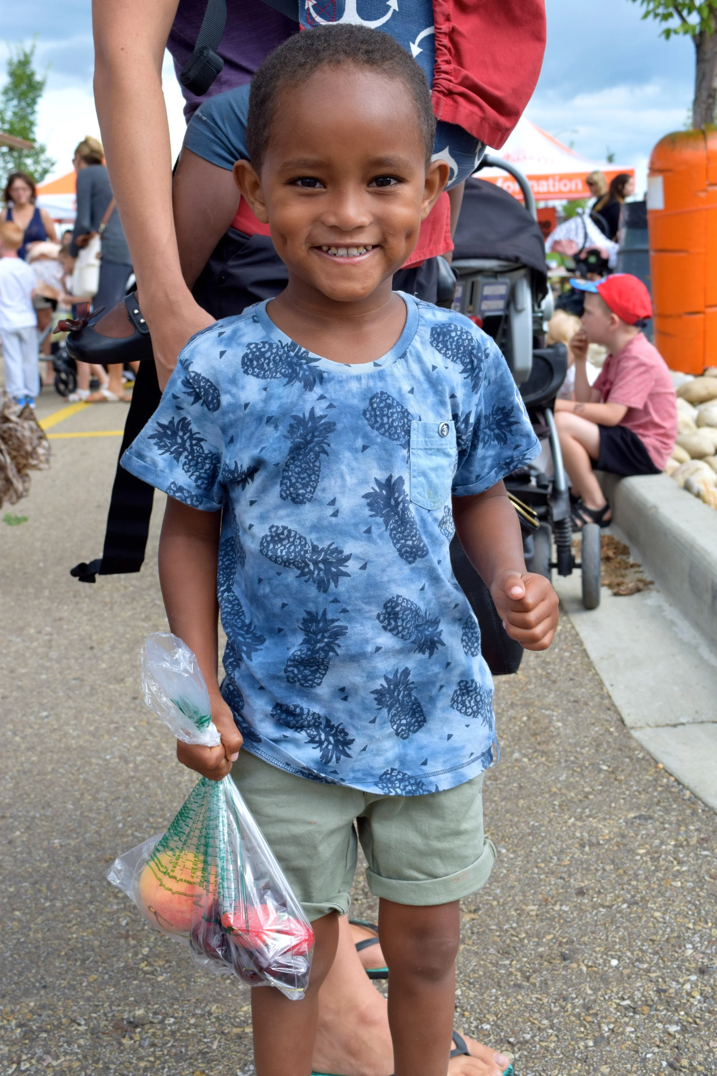 This week's photo of the week features a smiling Sprout excited to eat his mixed fruits!
