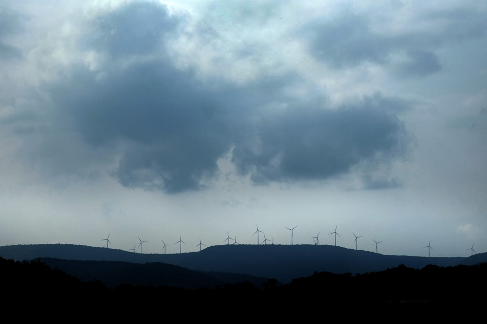  Wind turbines near Altoona, PA. Wind turbines do not produce any known air pollutants. © Brian Cohen, 2014. 