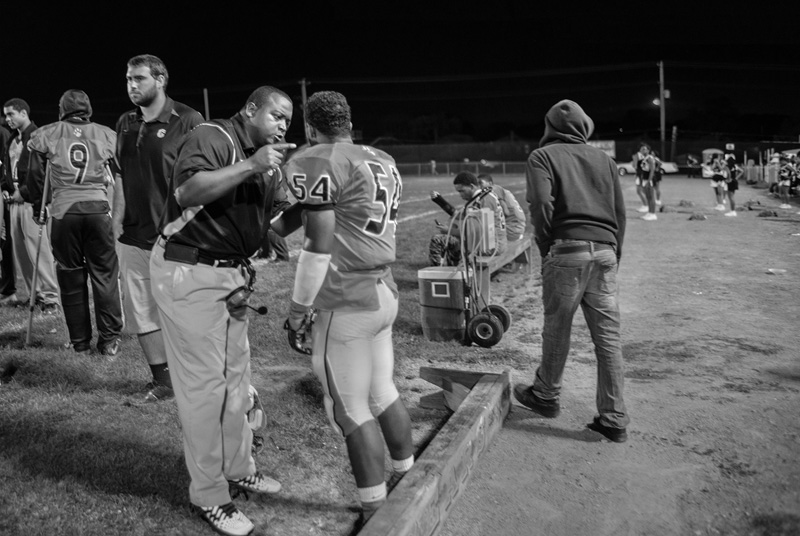  Clairton High School head coach Tom Nola addresses one of his players after a mistake during a game. Over the years, this team is regularly the best in Pennsylvania. Yet asthma is a problem known well by football players at Clairton Middle and High 