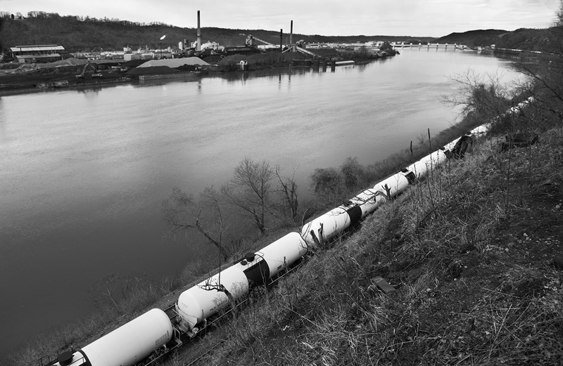  A train loaded with crude oil rolls past the Shenango Inc. coke works near Pittsburgh, PA. The U.S. Environmental Protection Agency describes coke oven emissions as “among the most toxic of all air pollutants.” The train is carrying crude oil from t