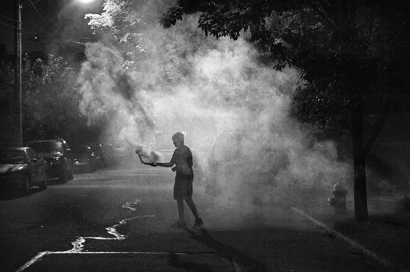  A boy playing with fireworks in the Bellevue borough of Pittsburgh. A new NOAA study shows that Fourth of July fireworks temporarily increase particulate pollution by an average of 42 percent. The effect is worse in the Pittsburgh area because of tr