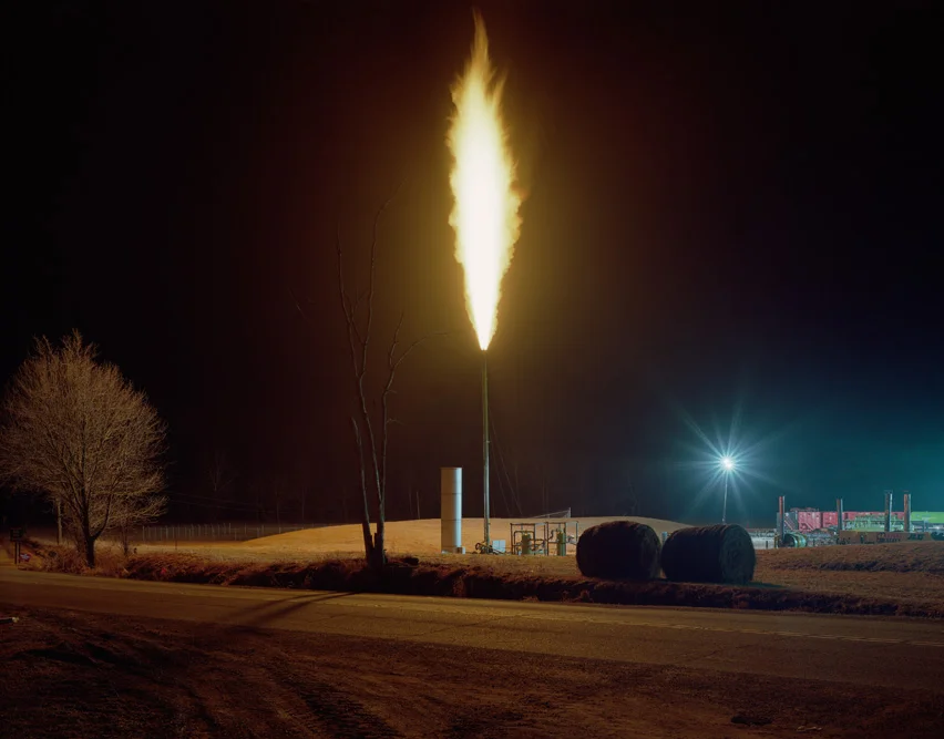 View of a gas flare at Gulfport Energy Corporation's Karen well pad in Quaker City, Ohio on 03/11/2014. Wells are being drilled across the states of Ohio, Pennsylvania and West Virginia to extract gas from the Marcellus and Utica Shale, rock formations that extends throughout much of the Appalachian Basin. Gas companies are using a technique known as hydraulic fracturing or "fracking", which involves pumping fluid into wells at high pressure in order to fracture the rock formation and release the gas. © Noah Addis/MSDP 2015