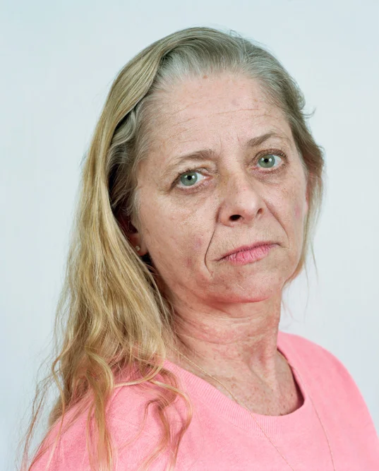 Kerri Bond poses for a portrait in Senecaville, Ohio on 02/19/2016. Her home in Seneca Township is 1200 feet from a well pad and a half mile from a natural gas compressor station. Bond claims the area has undergone drastic environmental changes since the industry came to the area in 2011. She says that many trees in the surrounding forest have died, and the vegetables she grows in her garden are often badly deformed. Bond says she now experiences nosebleeds, skin sores and rashes, respiratory problemsand other health problems. She plans to move to a farm in Kentucky. "This is going to affect us all if we can't grow food. " Bond said, "We live off the land, but I can't live here anymore. It's all gone." © Noah Addis/MSDP 2015