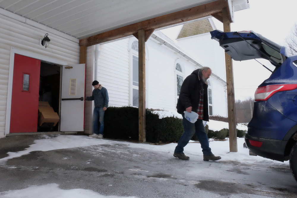  The weekly pick-up of water at White Oaks Springs Presbyterian Church in Evans City, Pa., continues for residents of The Woodlands in nearby Connequenessing, as it has done for the past four years.&nbsp; For those who can't make it to the church, vo