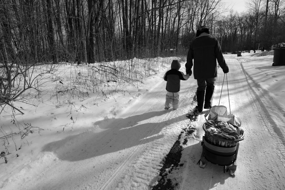 Kim McEvoy and her daughter have to walk several miles to a neighbor's home to do their laundry. Since drilling for gas began in their area, their water is either black, smelly, or simply gone. © Lynn Johnson/MSDP 2012