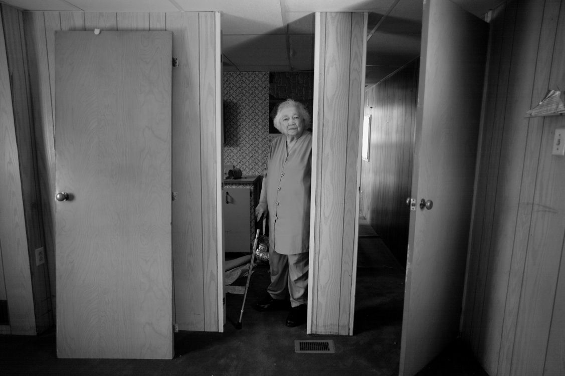  Betty Whyte stands in her now empty mobile home in Riverdale Trailer Park. The land underneath was sold to Aqua America as the site for a water extraction plant. Residents, many of whom were elderly and living on restricted budgets, were forced to m