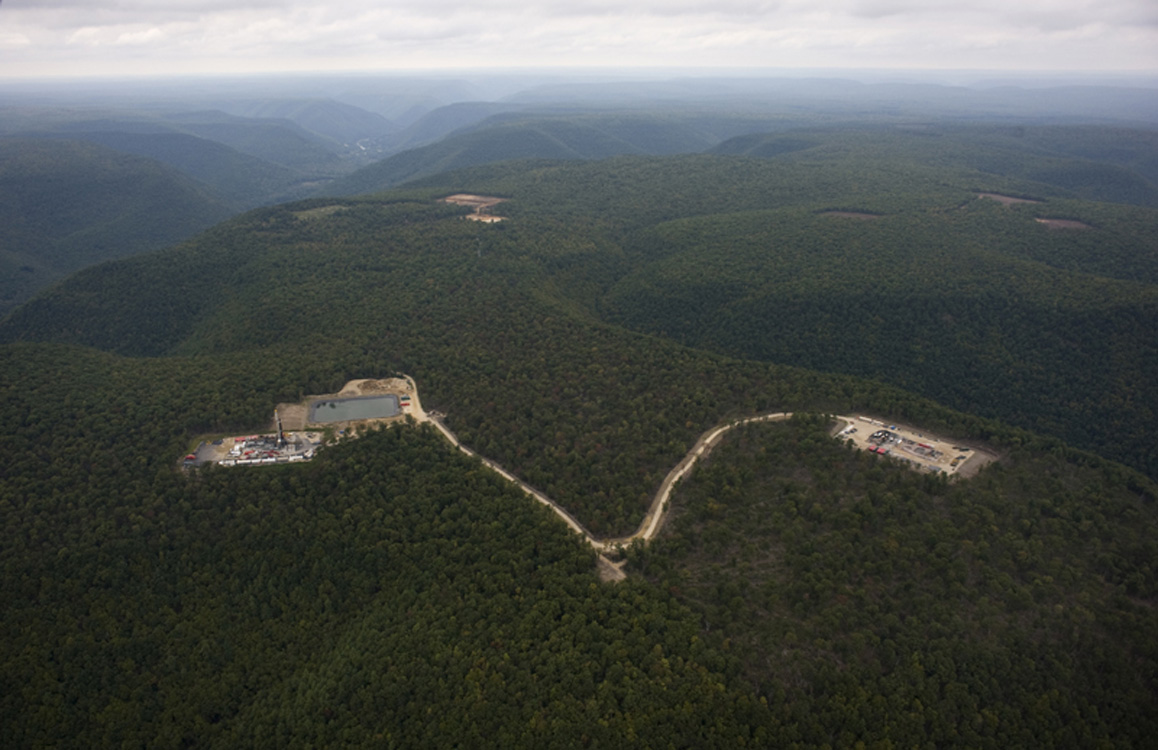  Marcellus Shale well with impoundments in the Tiadaghton State Forest in Lycoming County. Pennsylvania could lose upwards of 90,000 acres of forest to Marcellus drilling in the next twenty years.&nbsp; ©  &nbsp;Martha Rial/MSDP 2012  