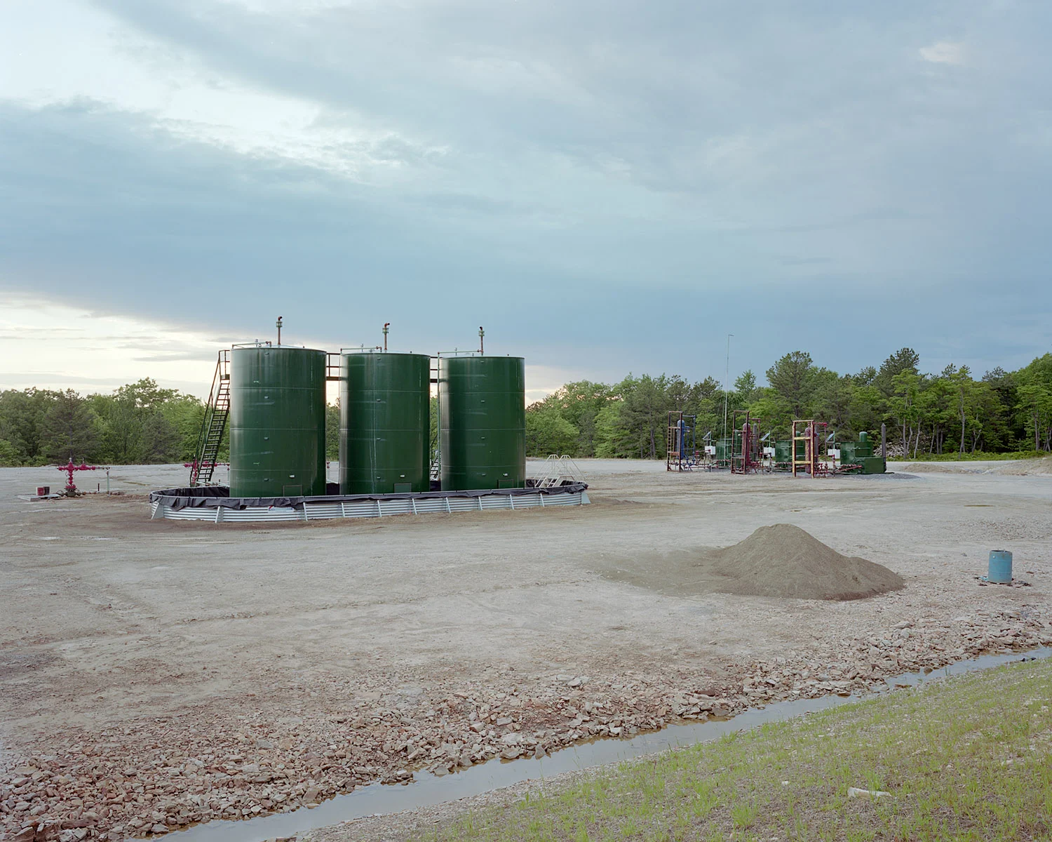 View of an EOG Resources well pad containing completed wells in the Moshannon State Forest in Penfield, PA on 06/06/2012. © Noah Addis/MSDP 2012