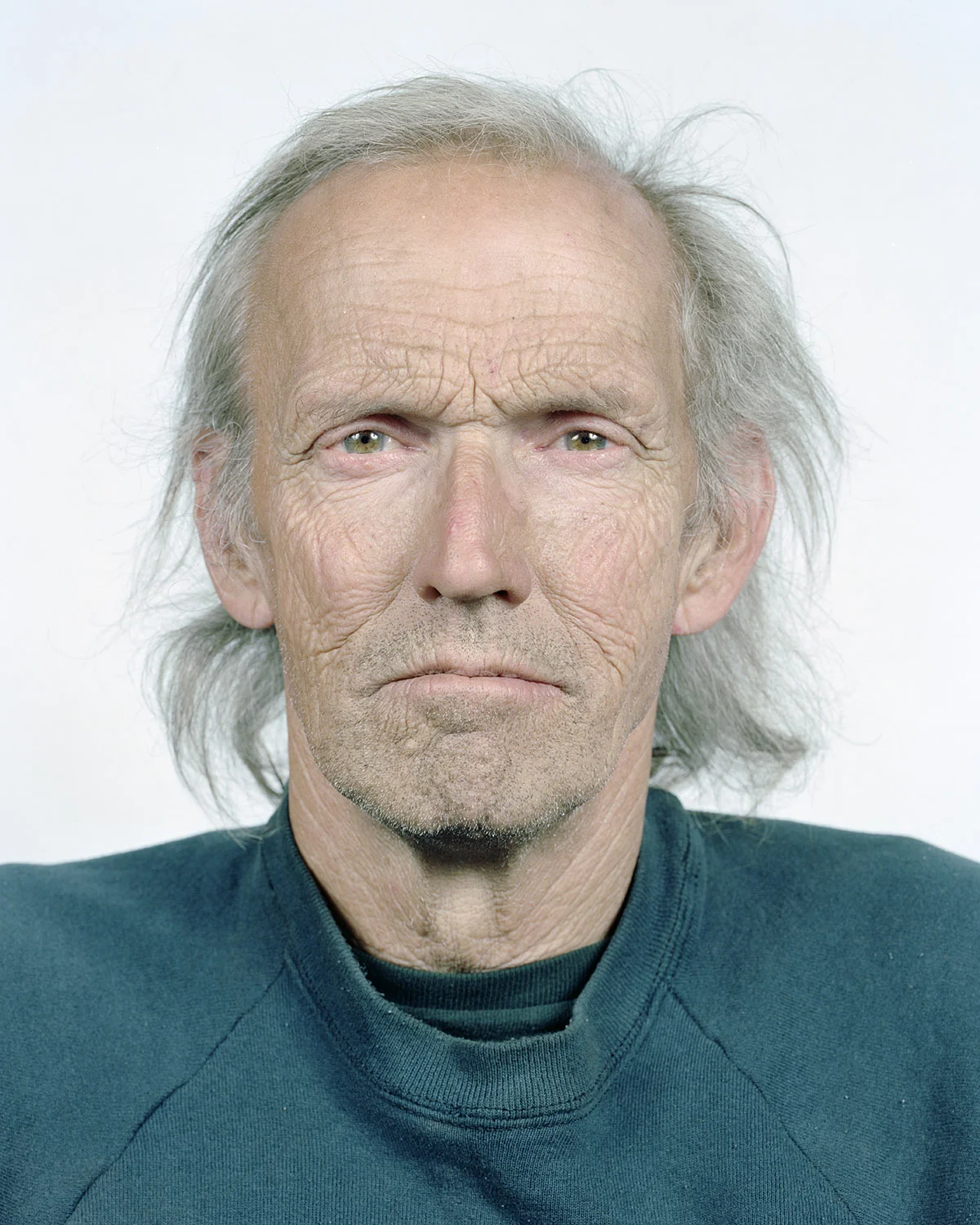 Fred McIntyre poses for a portrait at his home in Connoquenessing Township, PA on 04/30/2012. McIntyre, who has lived in his home for twenty years, claimsthat his water turned purple and foamy after several Marcellus Shale gas wells were drilled in the area in January of 2011. He and his family now drink only bottled water. © Noah Addis/MSDP 2012