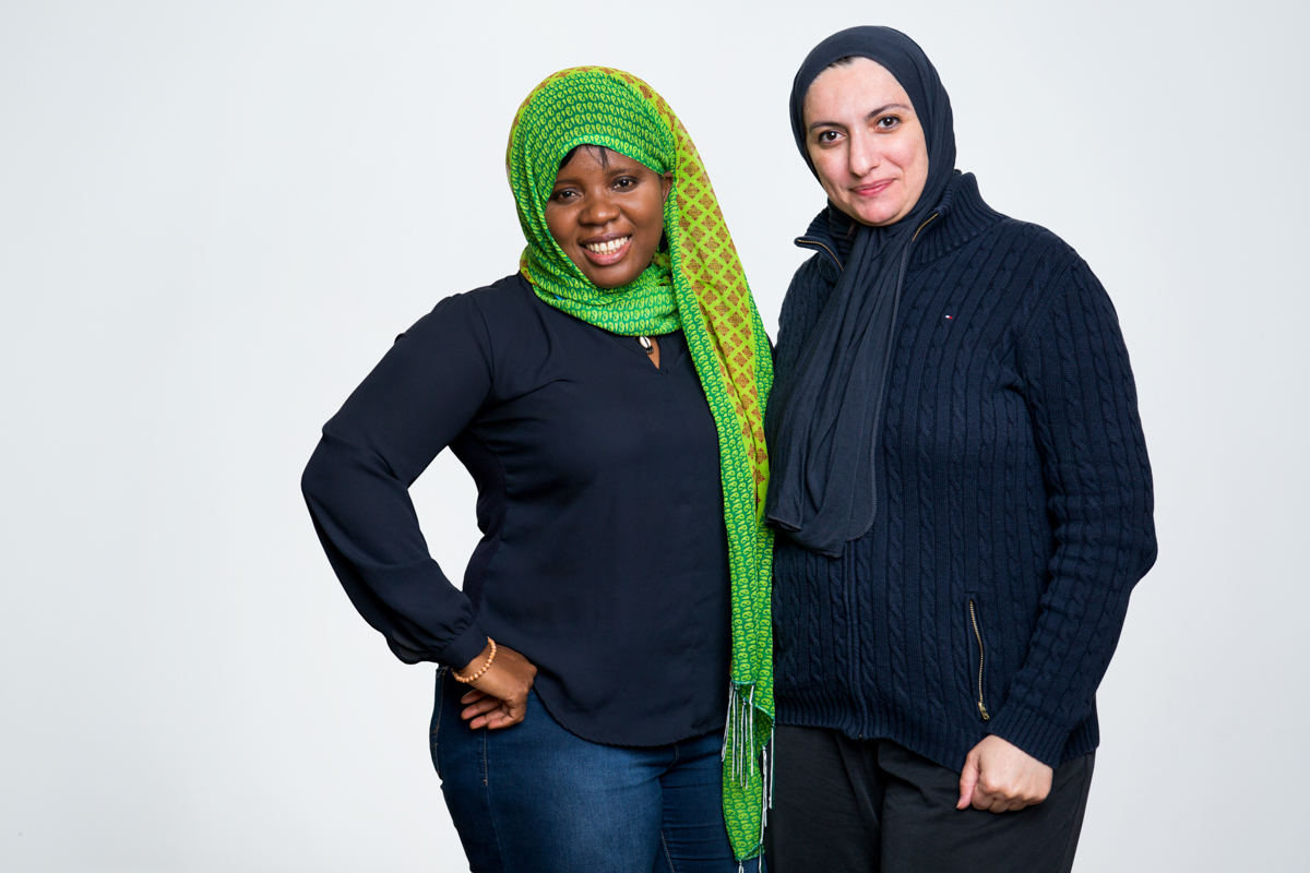  Mounia Alaoui-El-Azher was born in Morocco. She arrived in the U.S. in 2001.     Ame Koffi was born in Togo. She arrived in the U.S. in 2009.     Both are Muslim.     Mounia’s first move out of her native Morocco was to Paris for post-graduate schoo