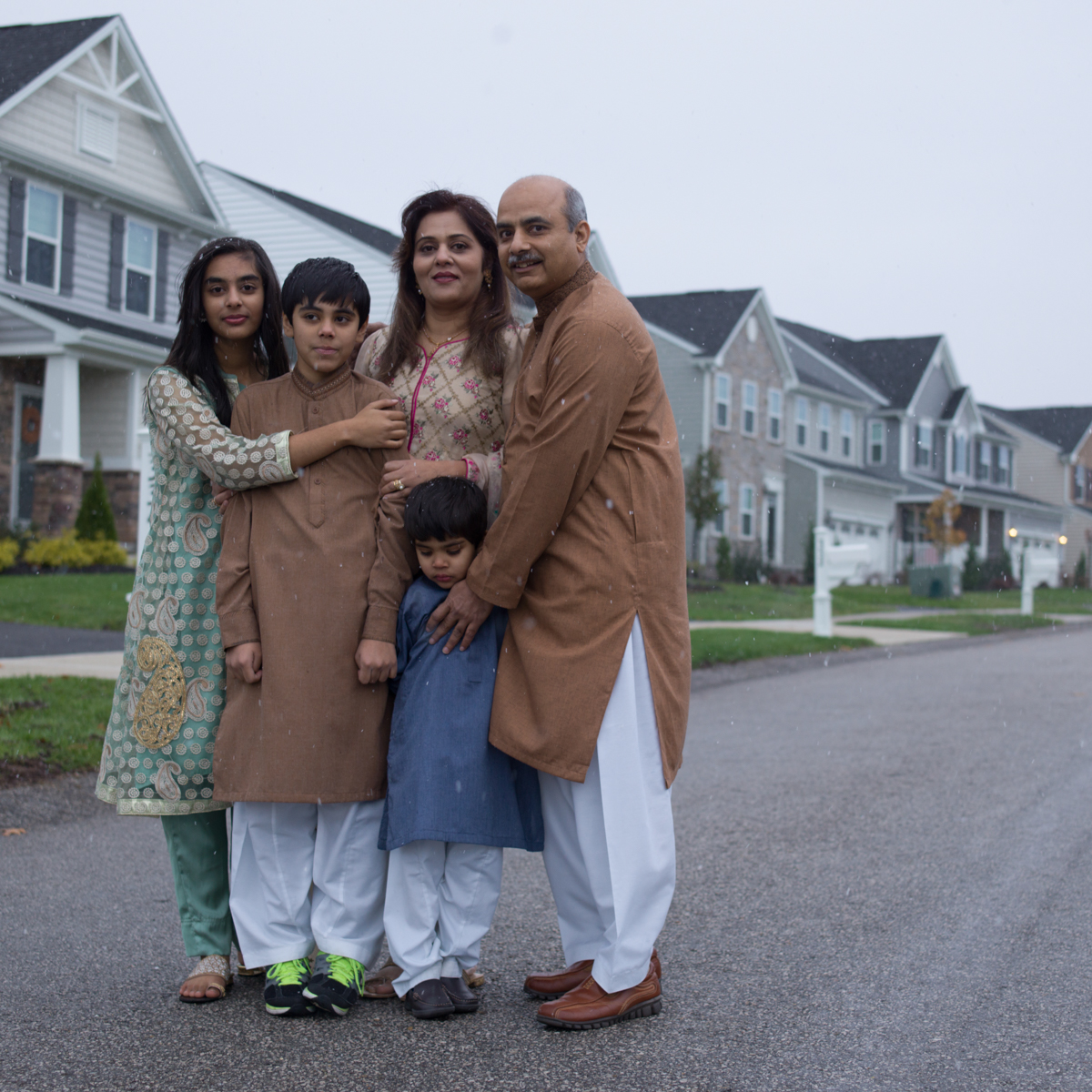  Mirza family from Pakistan: Naeem Mirza, fifty-one; Raqna Mirza, forty-two; Laiba Mirza, fourteen; Mohid Mirza, twelve; Muhab Mirza, four.     Naeem Mirza has been in the U.S. for eighteen years. His first visit was in 1999. His company transferred 