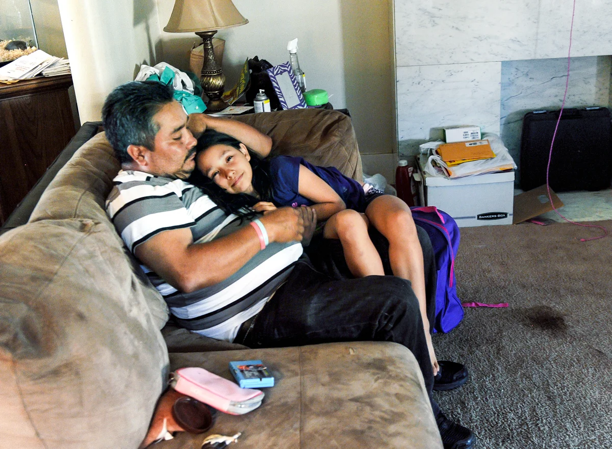 Jose talks with his daughter Emma at their home in Pittsburgh. © Nate Guidry/TDW 2017