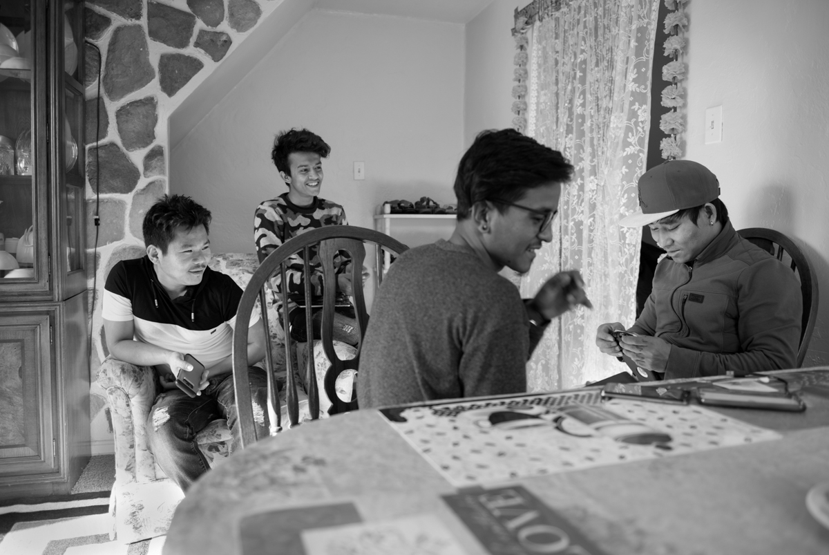  Som has developed a small group of friends in his neighborhood that is comprised of 80% refugees from 6 different countries. These boys are meeting at Som's apartment shortly before Som departed for work. They are working together to replace a Sim c