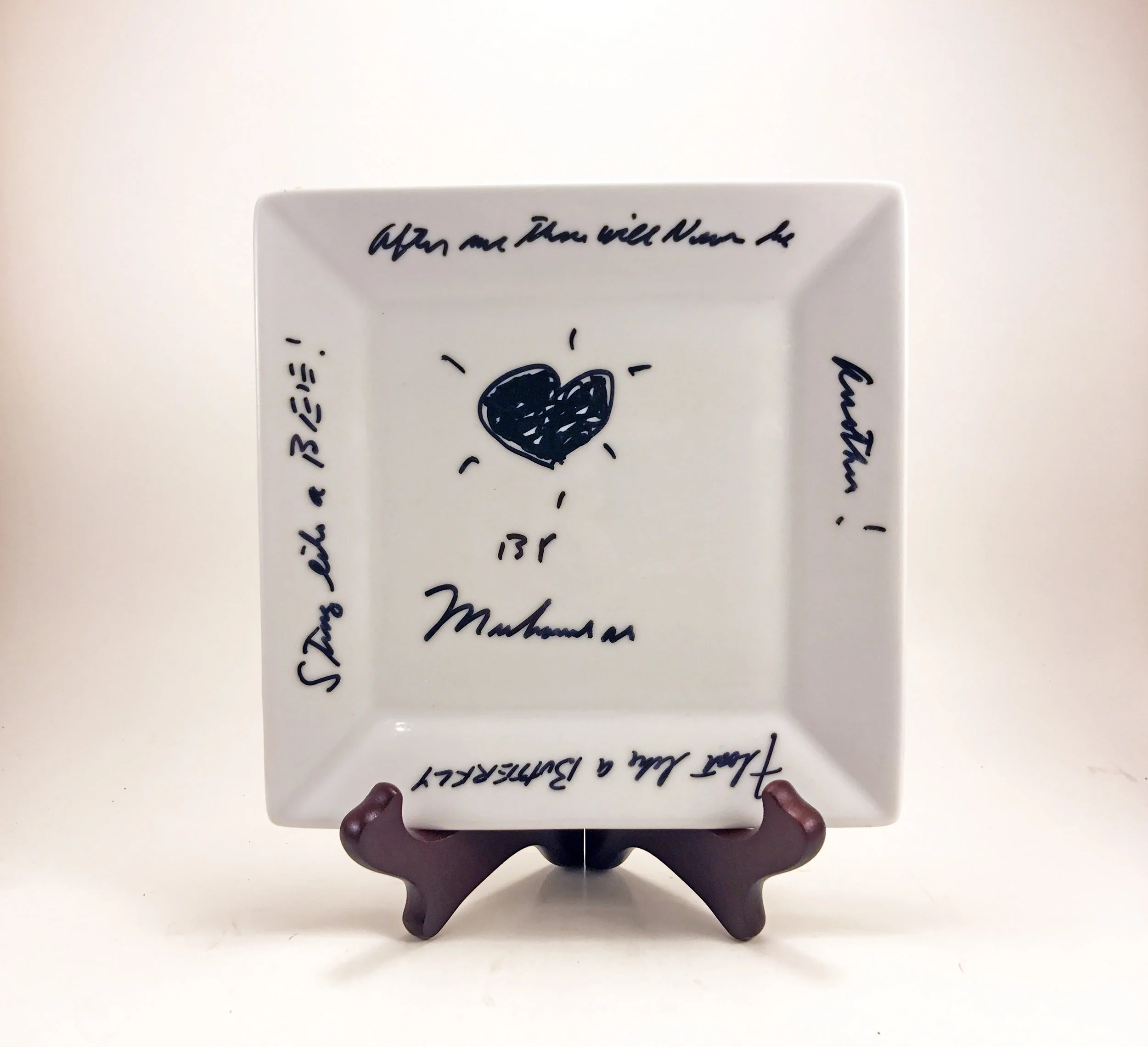 Muhammad Ali Drawing on Ceramic Plate