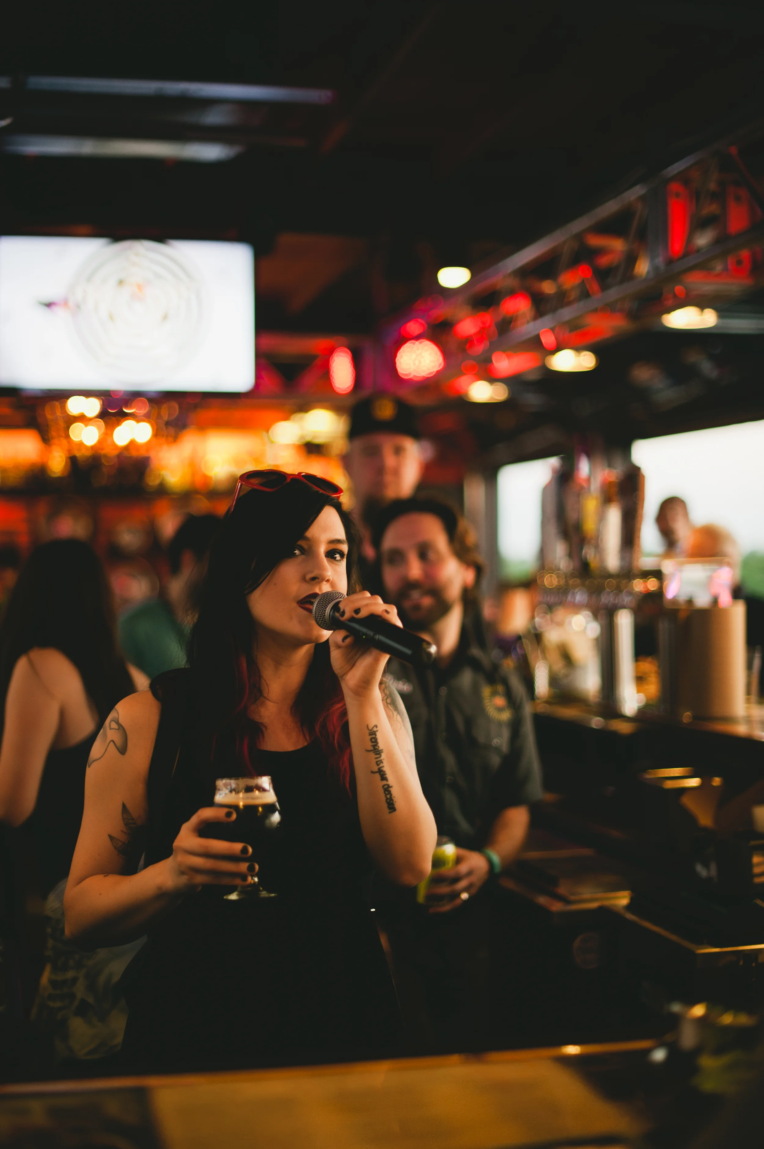 Jessie Frye toasting the sunset at LSA with Boss Bitch in hand. Photo by Shaina Sheaff.