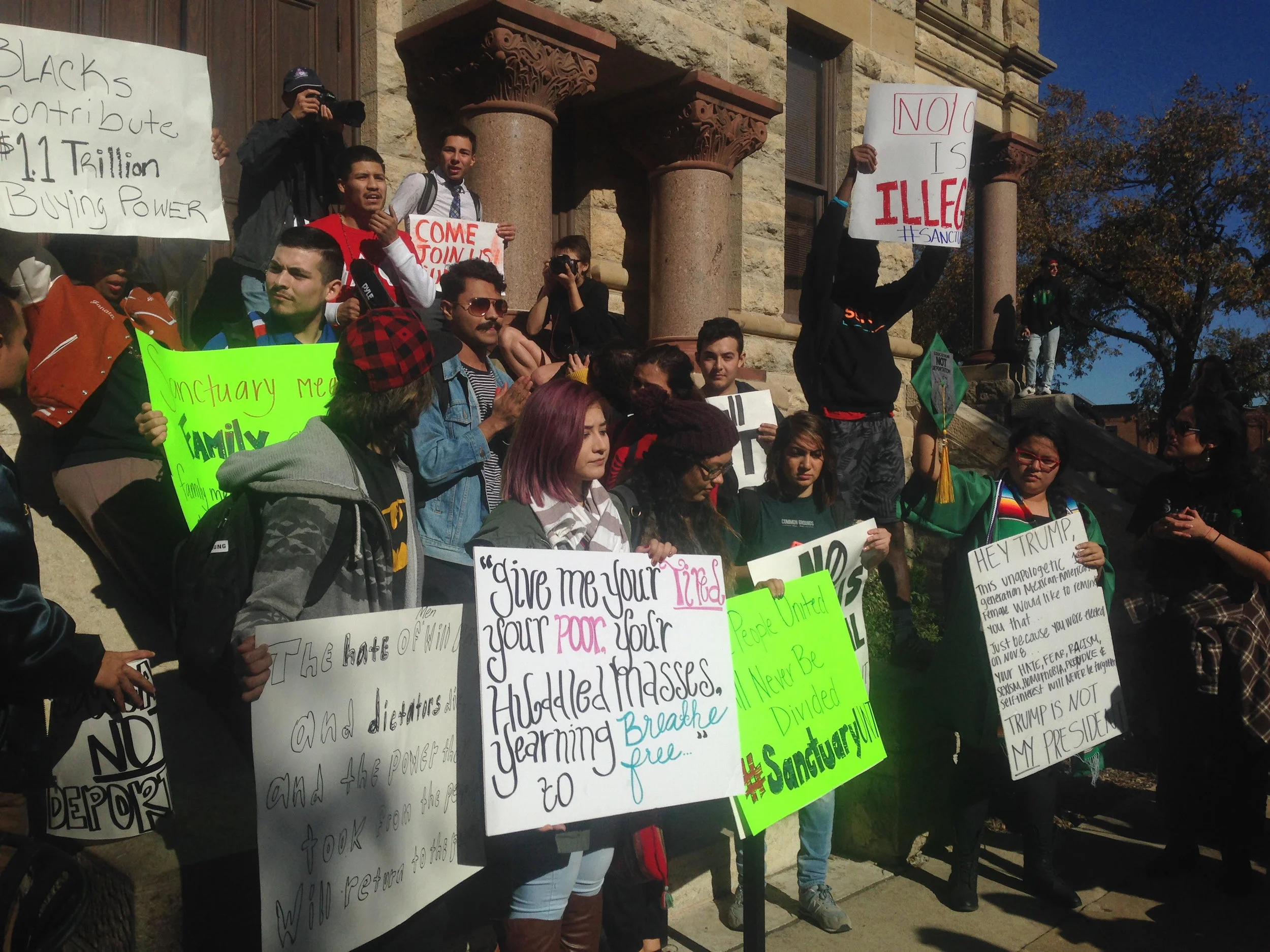 Protestors in downtown Denton. Photo by Jackie Thompson.