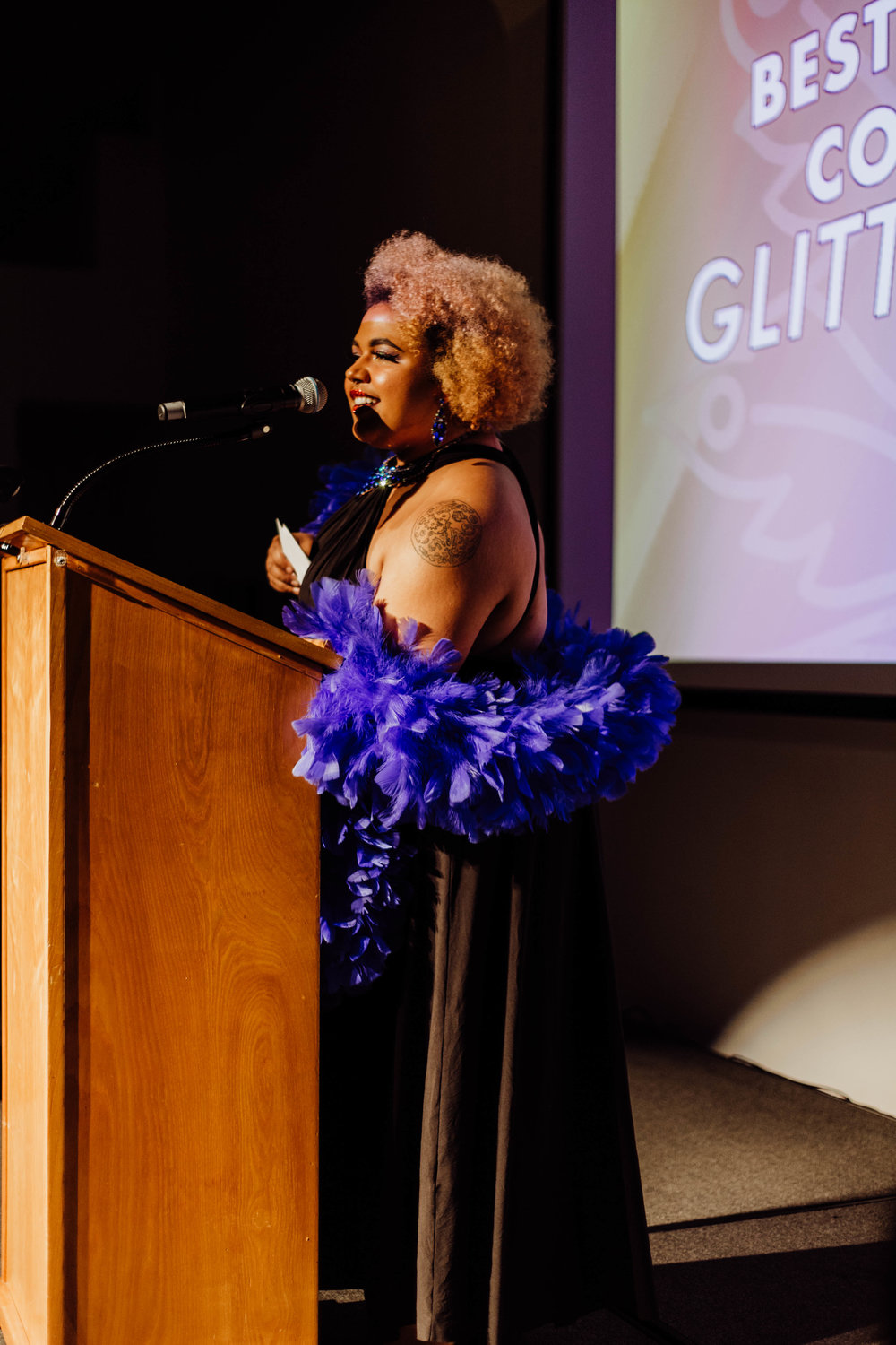  Naomi Kliewer accepting Glitterbomb’s award for Best Creative Collective. 