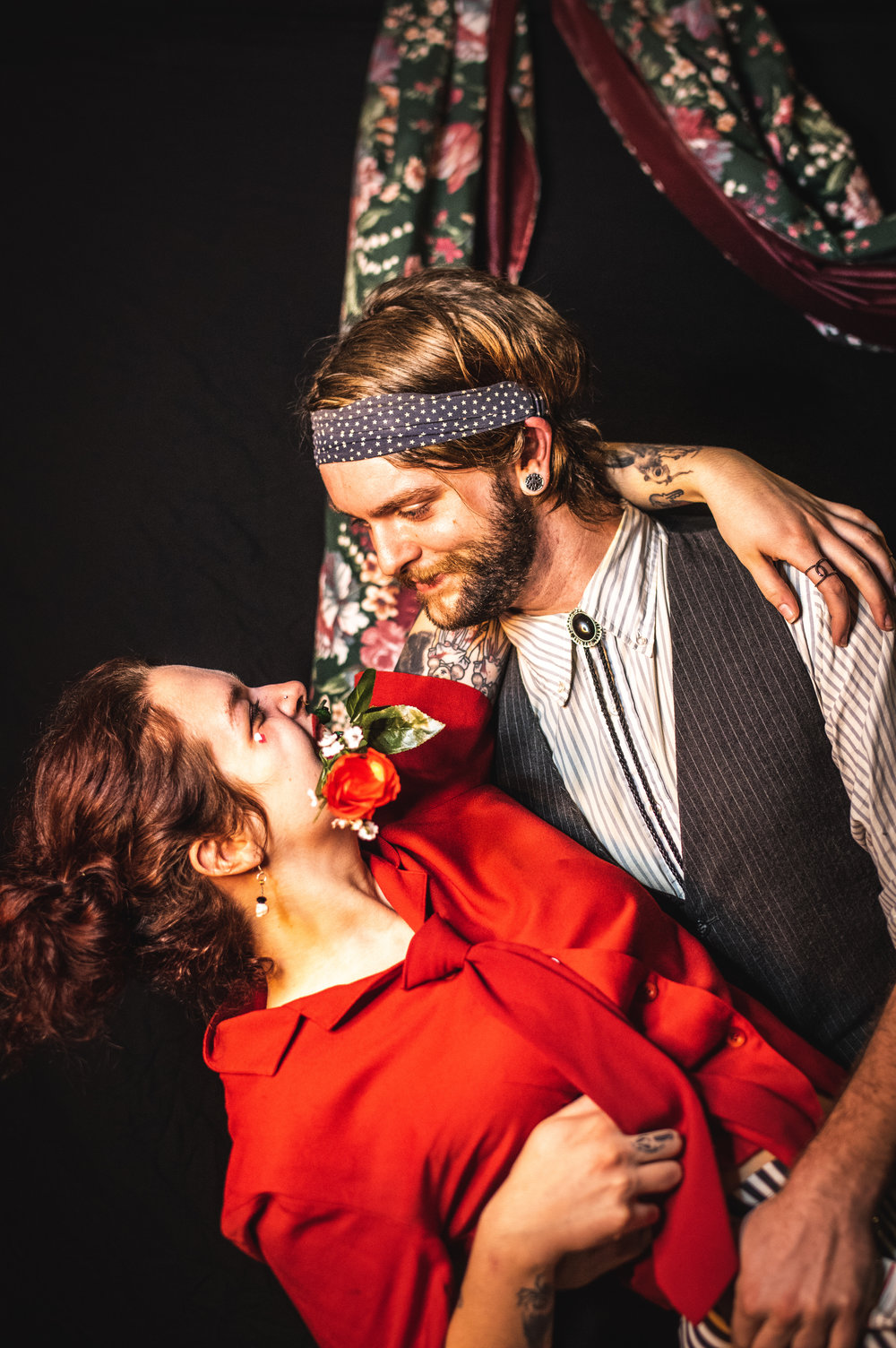  Erin Devany and Charlie DeBolt having fun in the photobooth. 